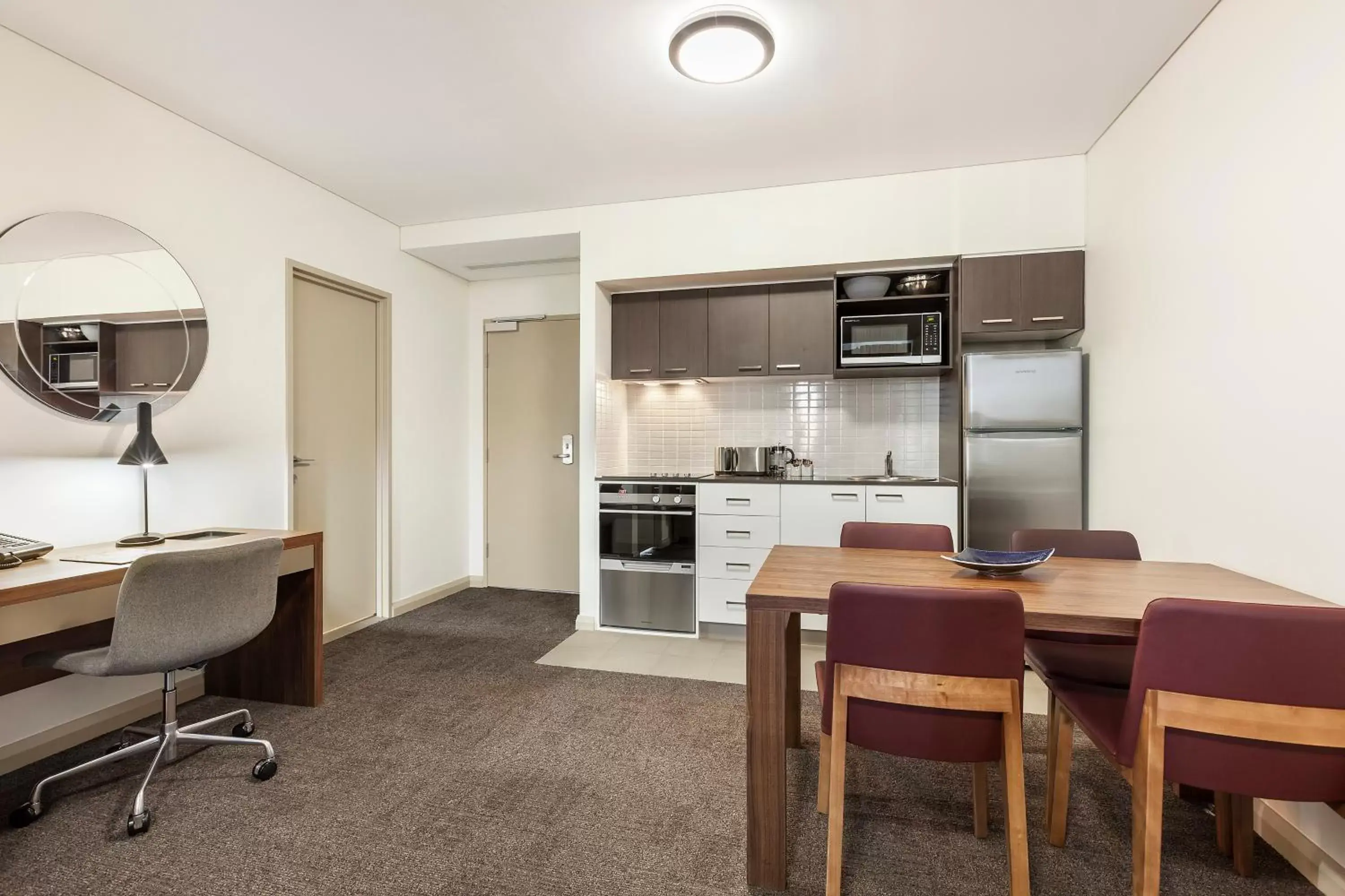Kitchen or kitchenette, Dining Area in Quest at Sydney Olympic Park