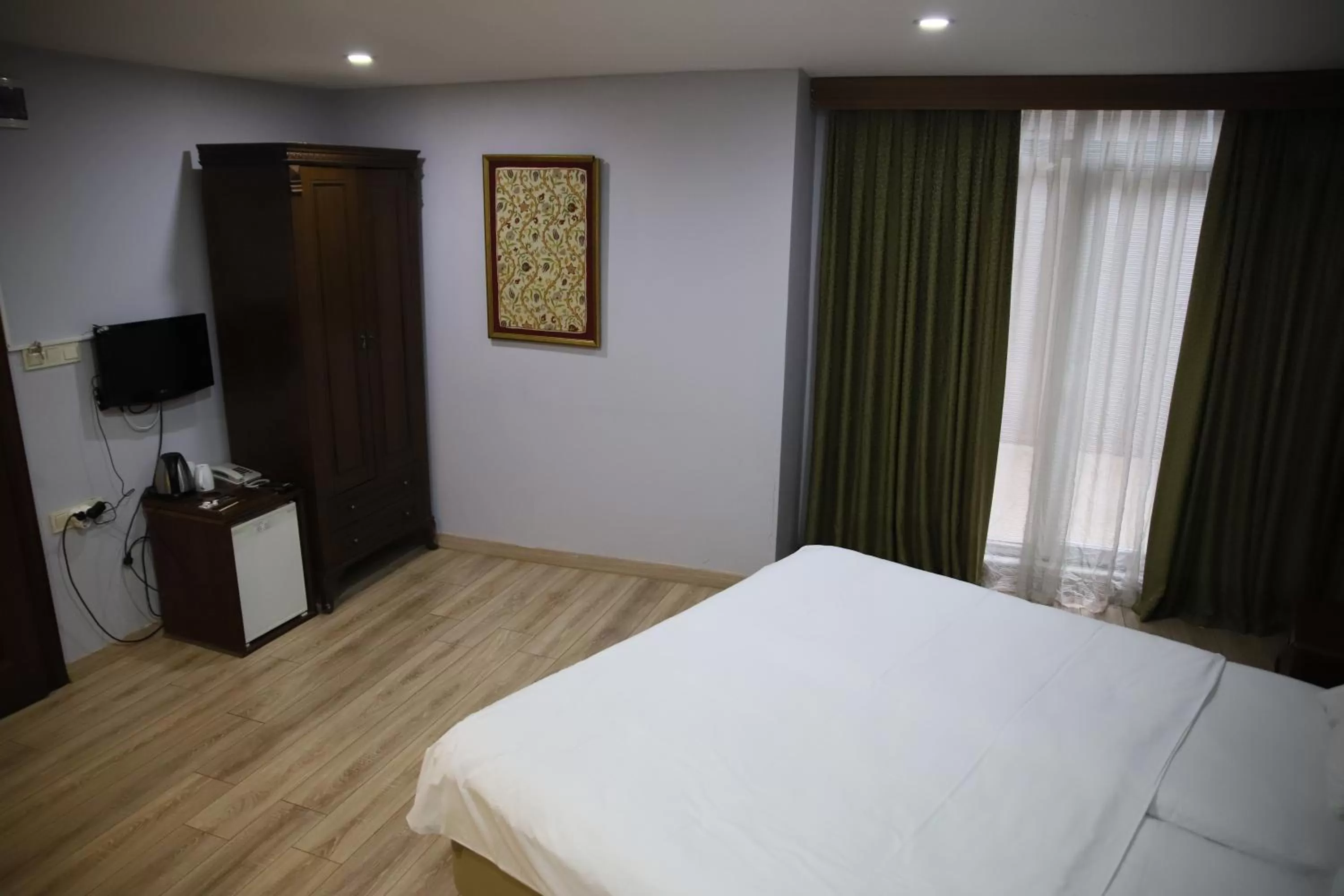 Bed in Basileus Hotel