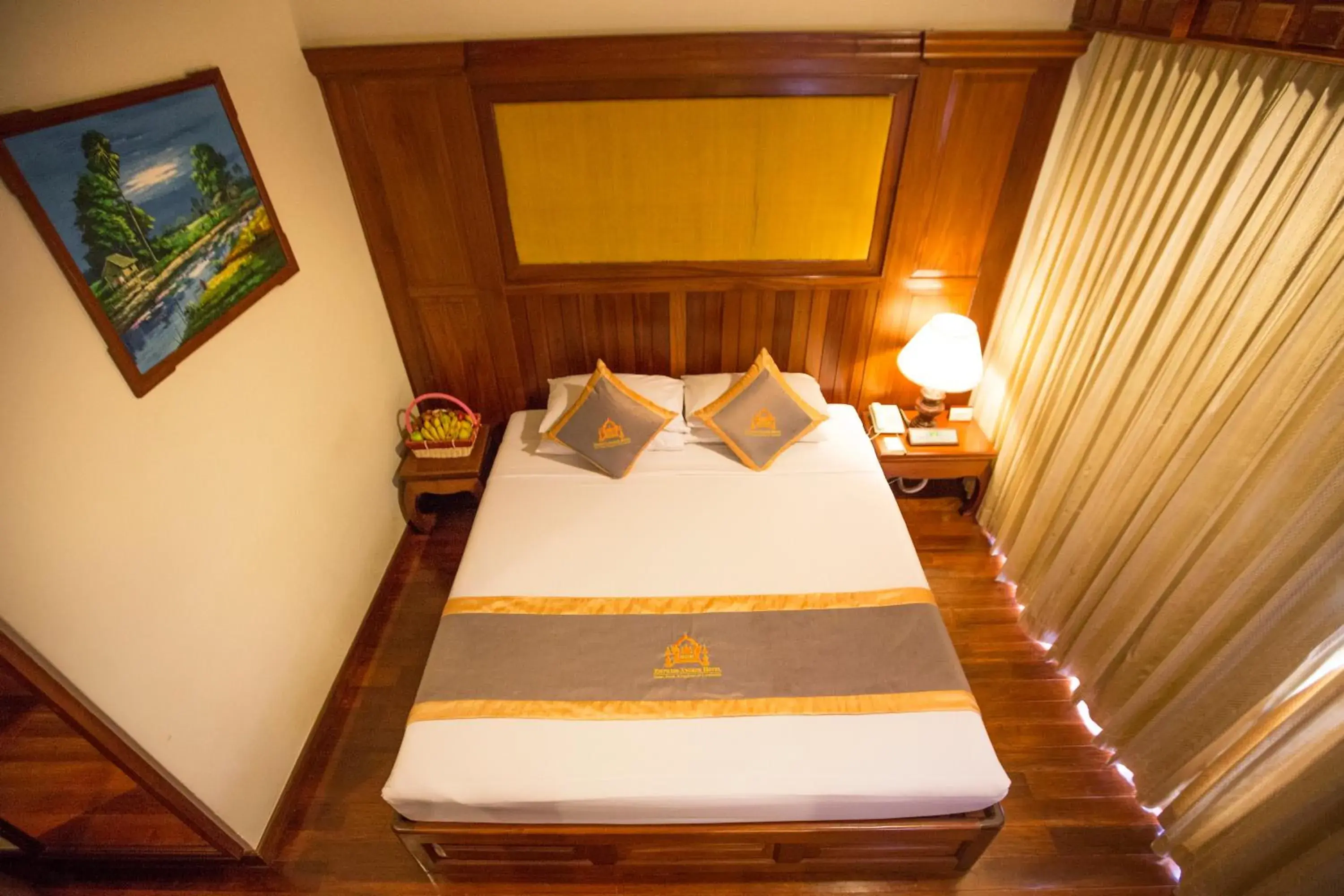Bed in Empress Residence Resort and Spa
