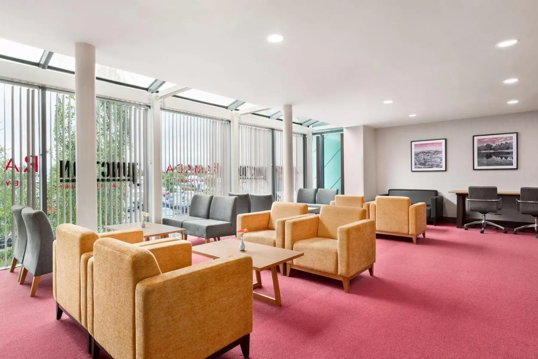 Communal lounge/ TV room, Seating Area in Ramada by Wyndham Cobham