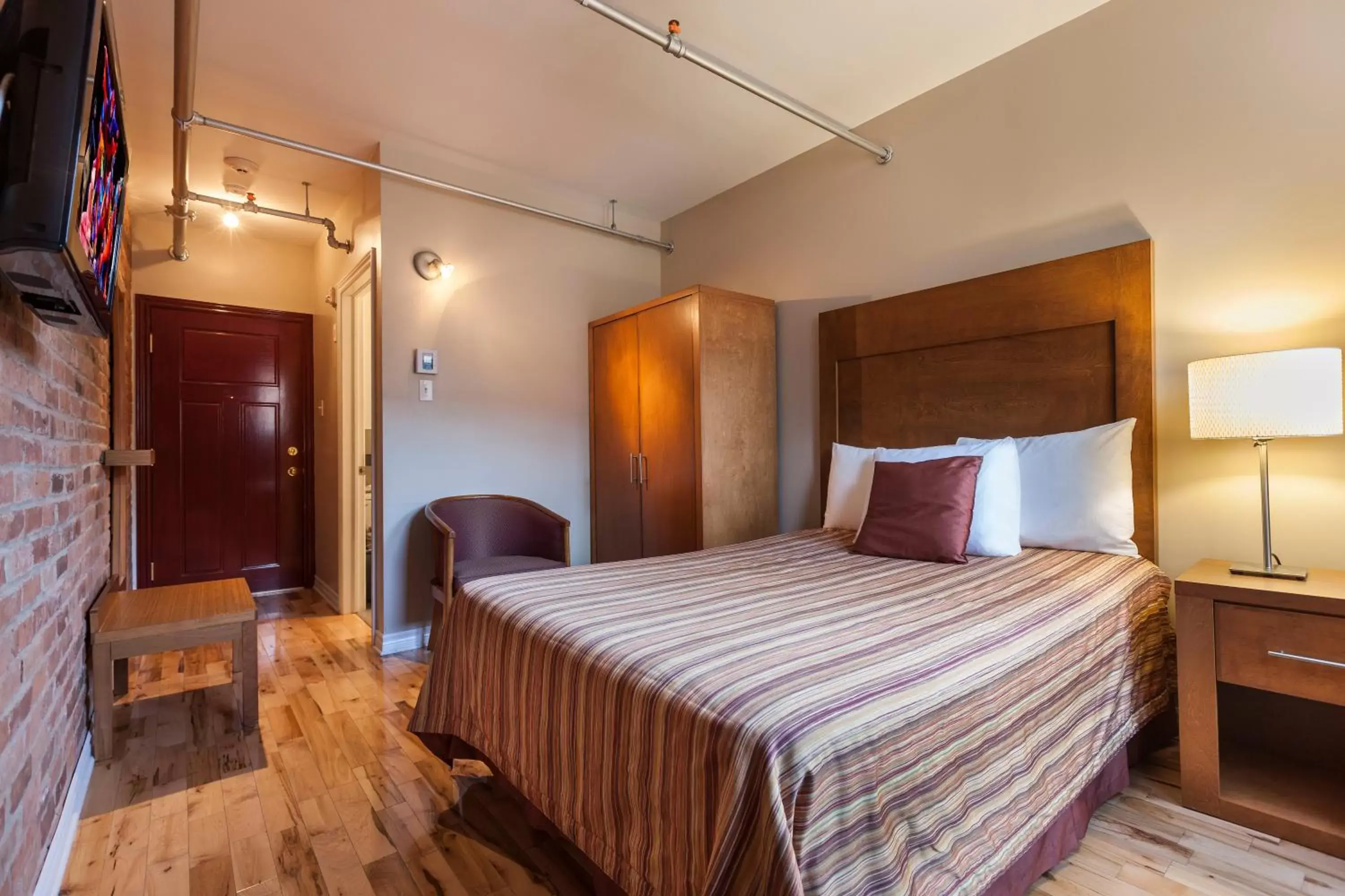 Bed in Hotel Abri du Voyageur
