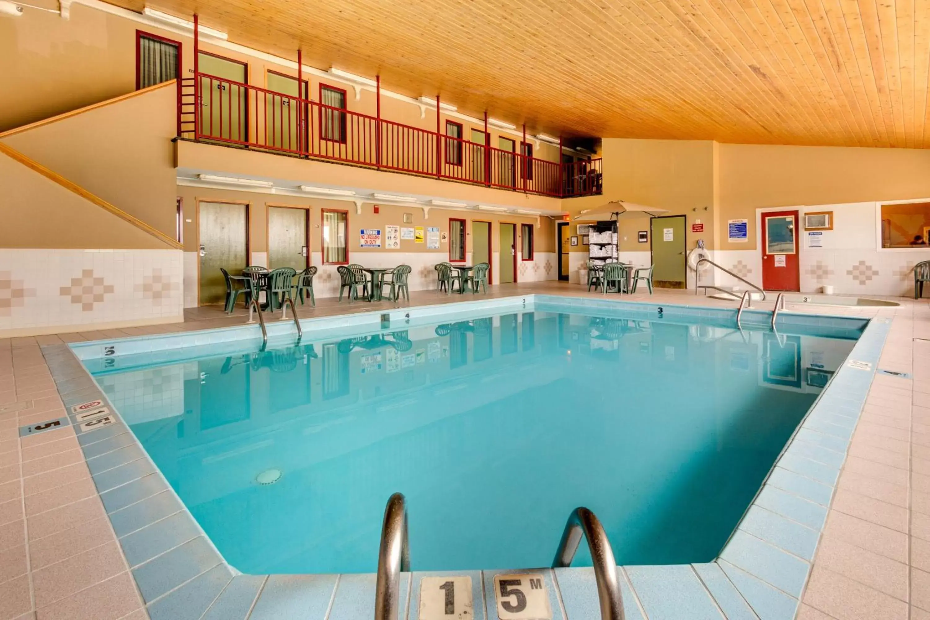 Balcony/Terrace, Swimming Pool in Fireside Inn and Suites