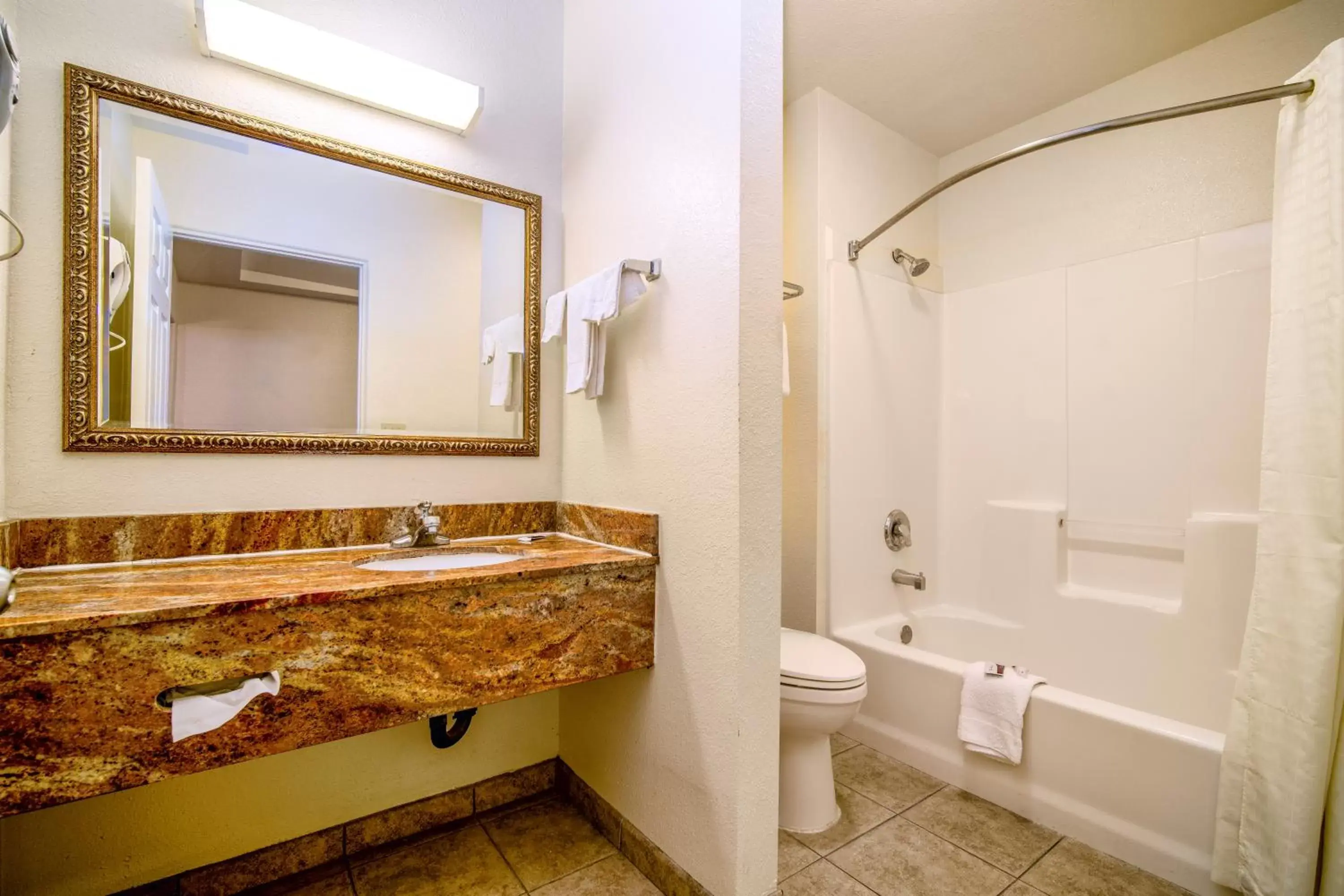 Bathroom in Regency Inn & Suites Downey