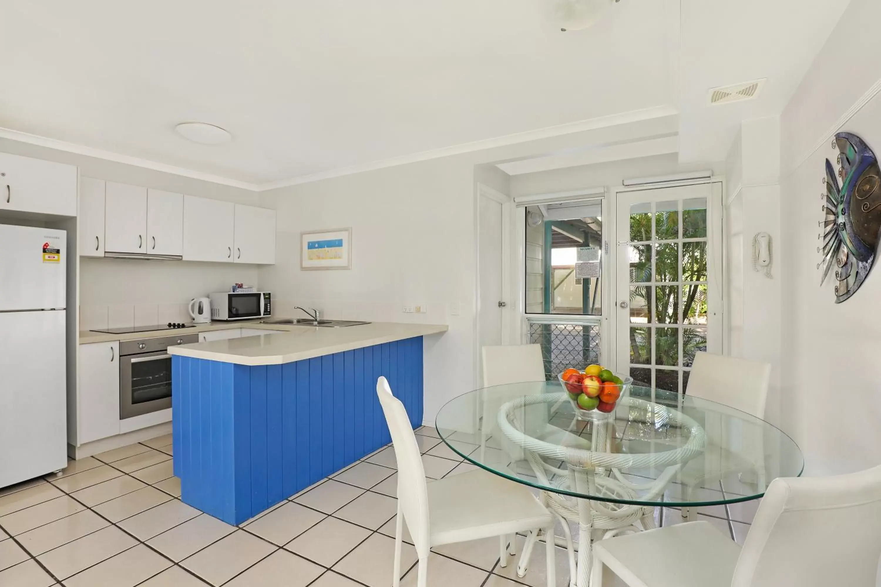 Kitchen/Kitchenette in Coral Beach Noosa Resort