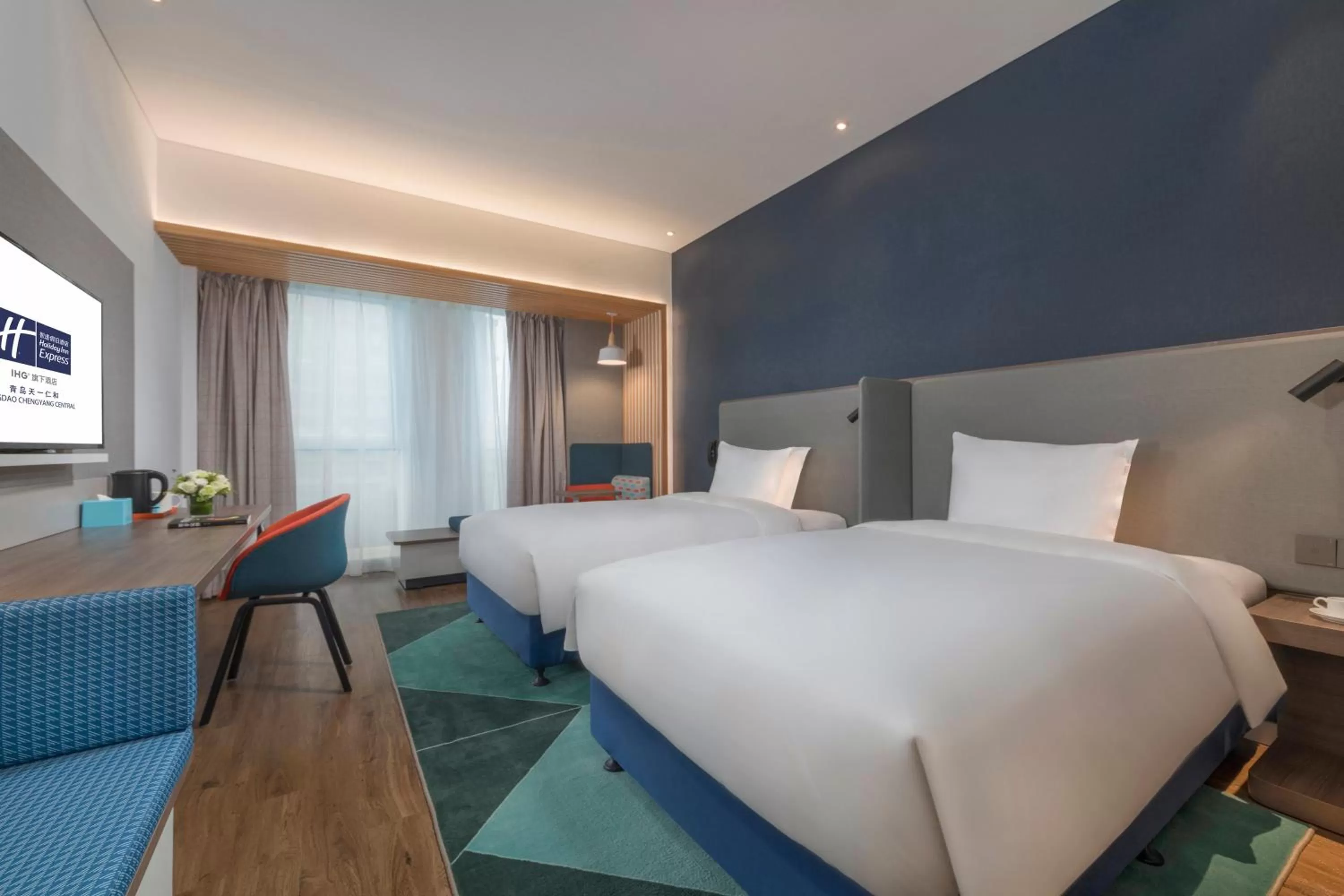Photo of the whole room, Bed in Holiday Inn Express Qingdao Chengyang Central by IHG