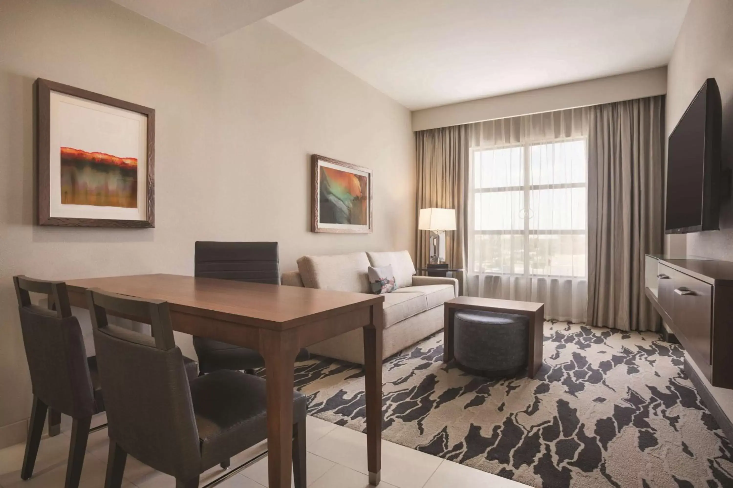 Living room, TV/Entertainment Center in Embassy Suites by Hilton McAllen Convention Center