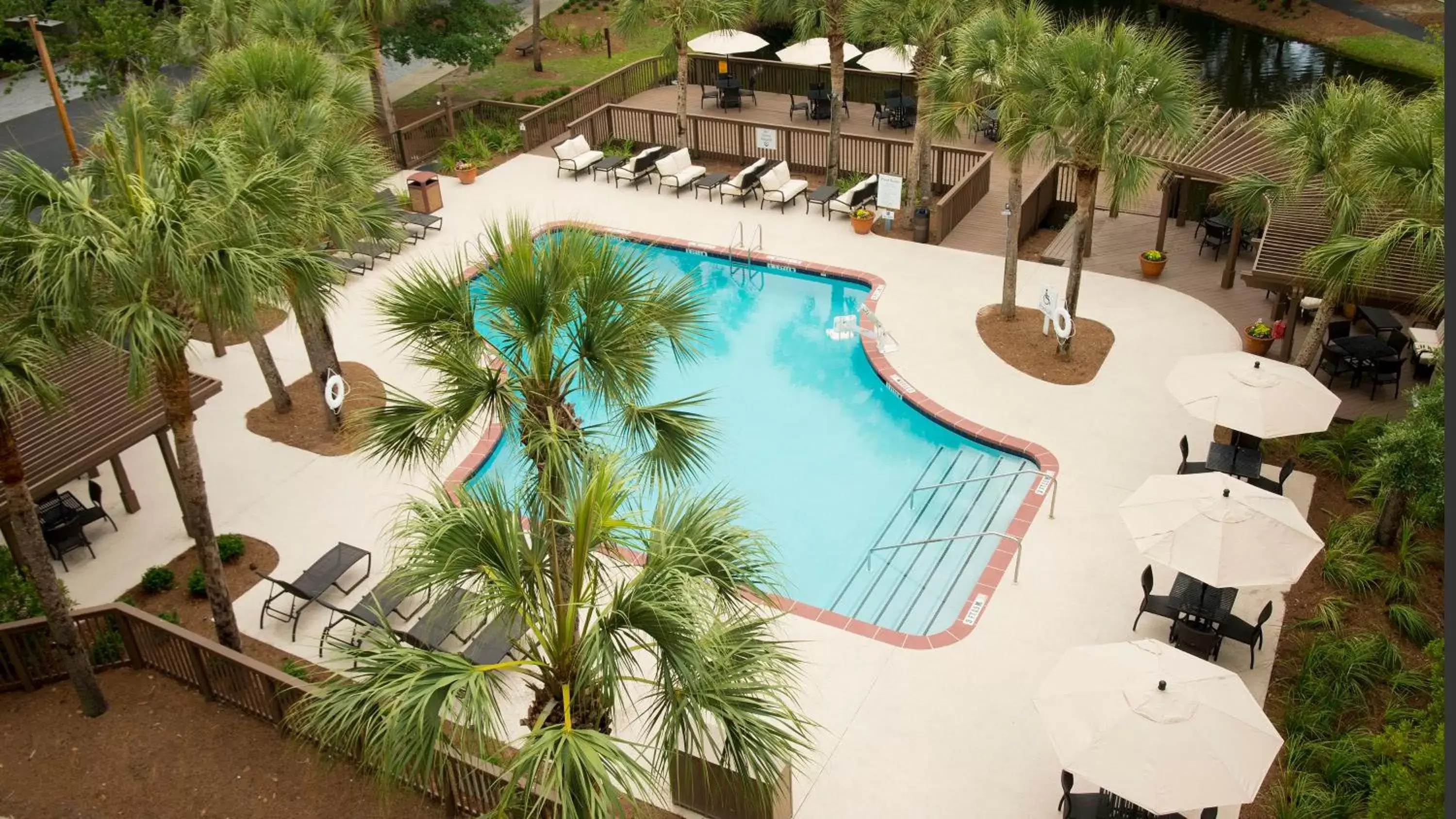 Swimming pool, Pool View in Holiday Inn Express Hilton Head Island, an IHG Hotel