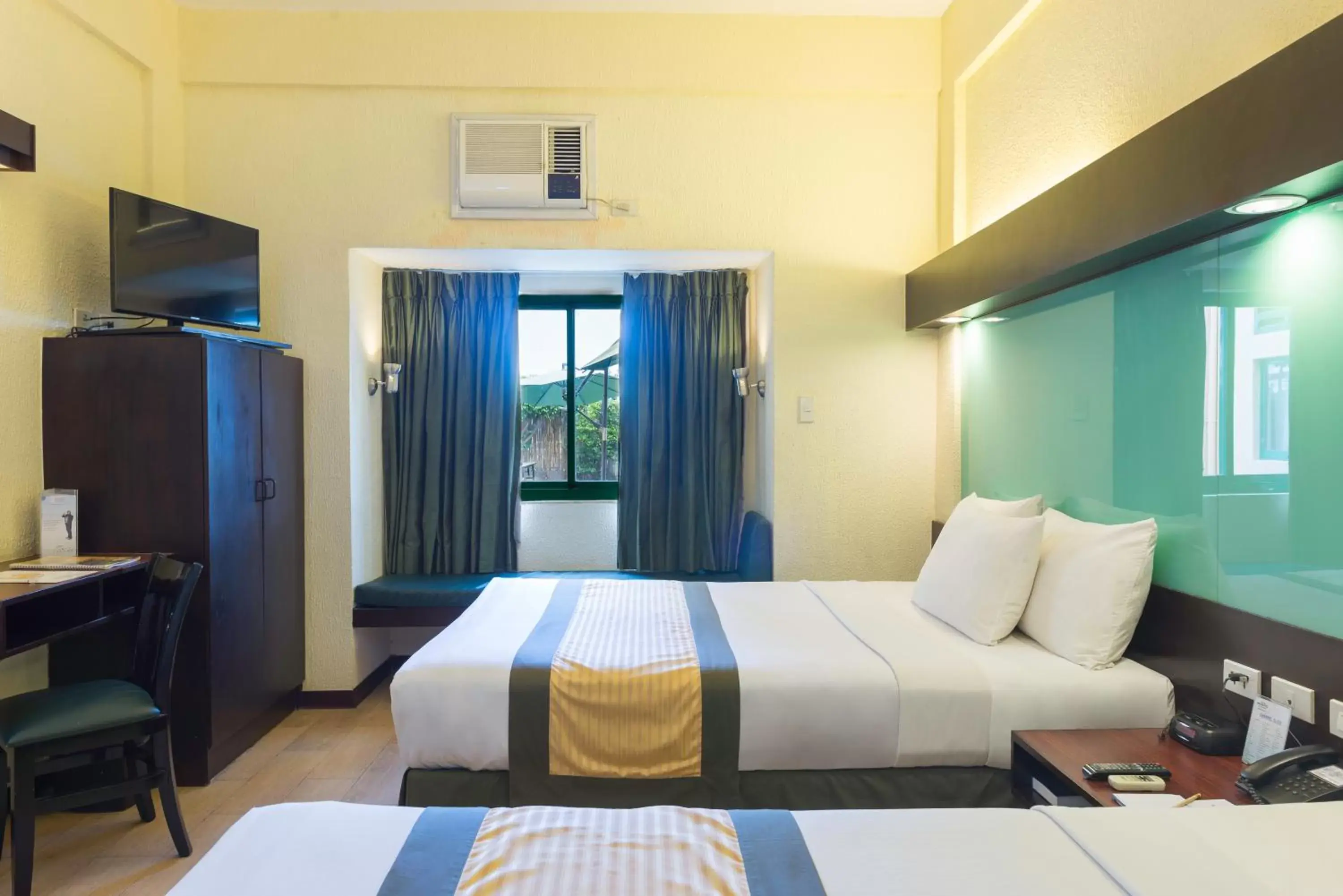 Bedroom, Bed in Microtel by Wyndham Cabanatuan