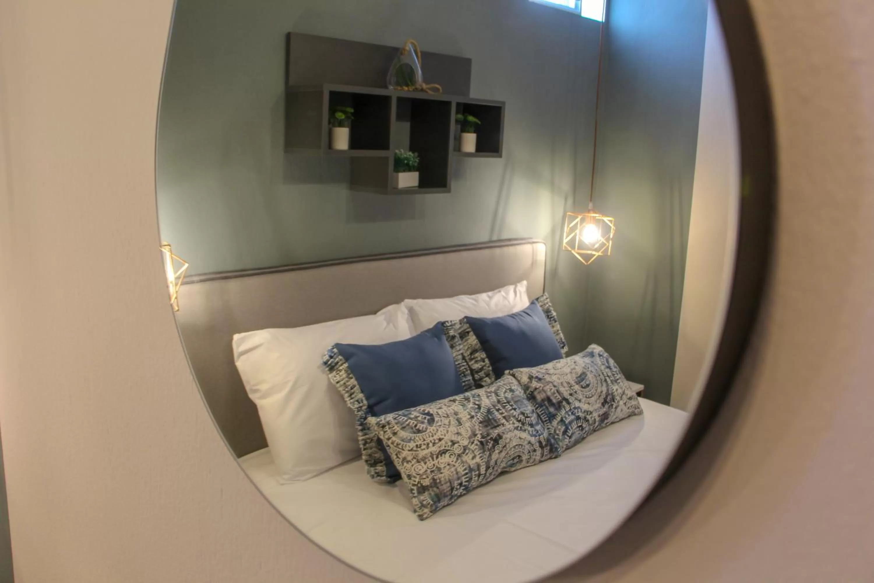 Bedroom in Lamprini's Deluxe Studios