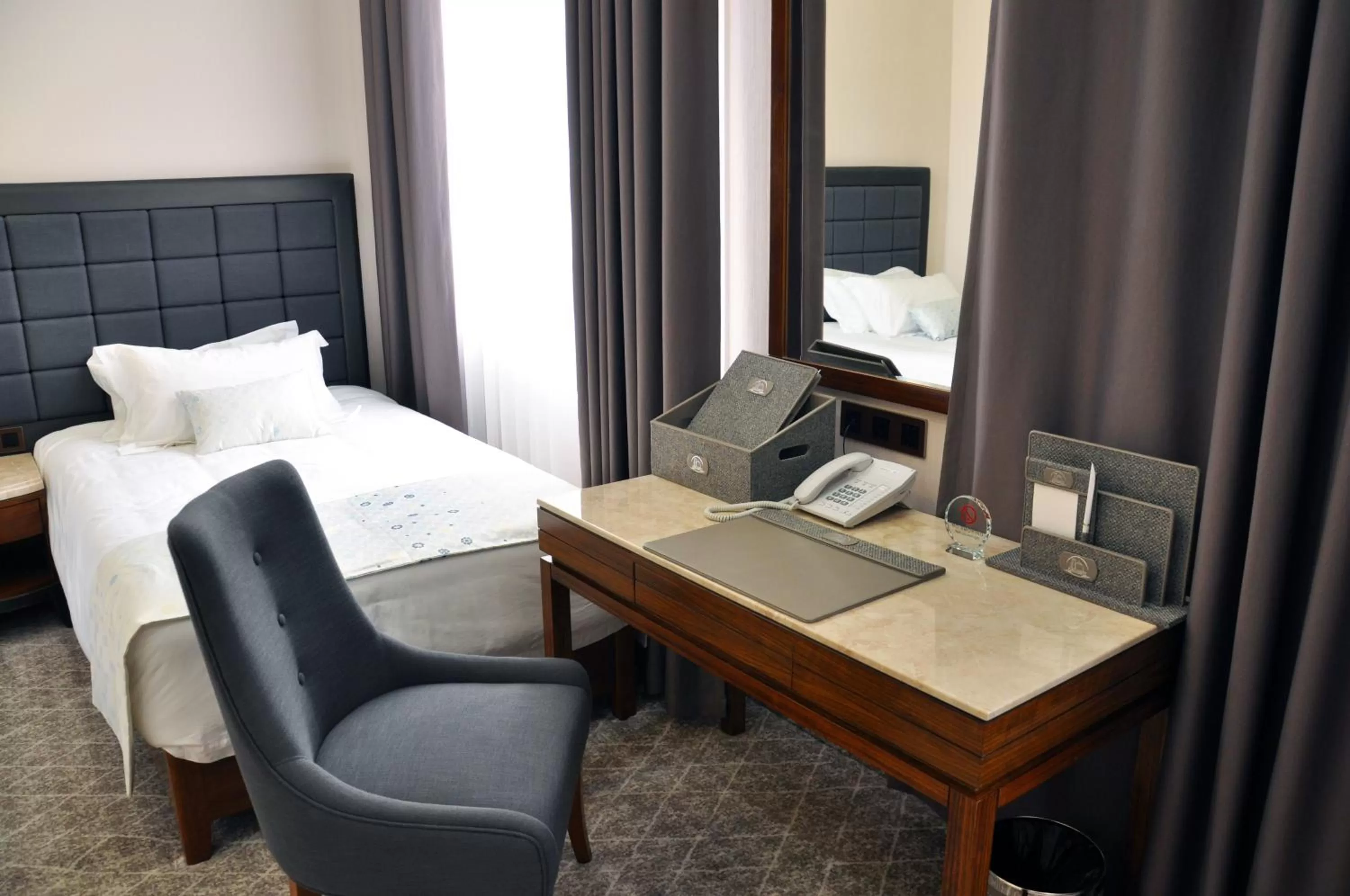 Bed in Parliament Palace Hotel