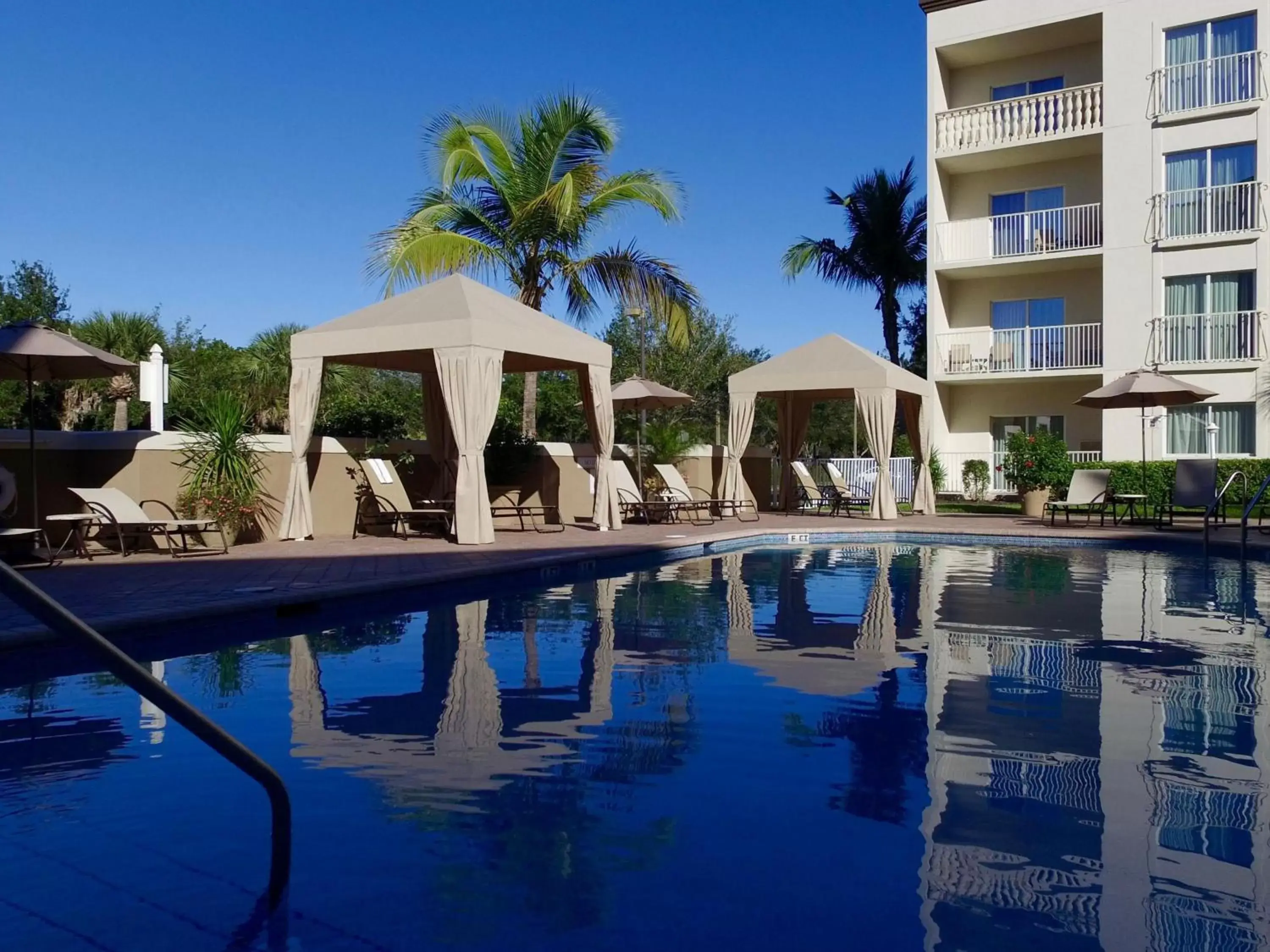 Swimming Pool in Holiday Inn Express & Suites Naples Downtown - 5th Avenue, an IHG Hotel