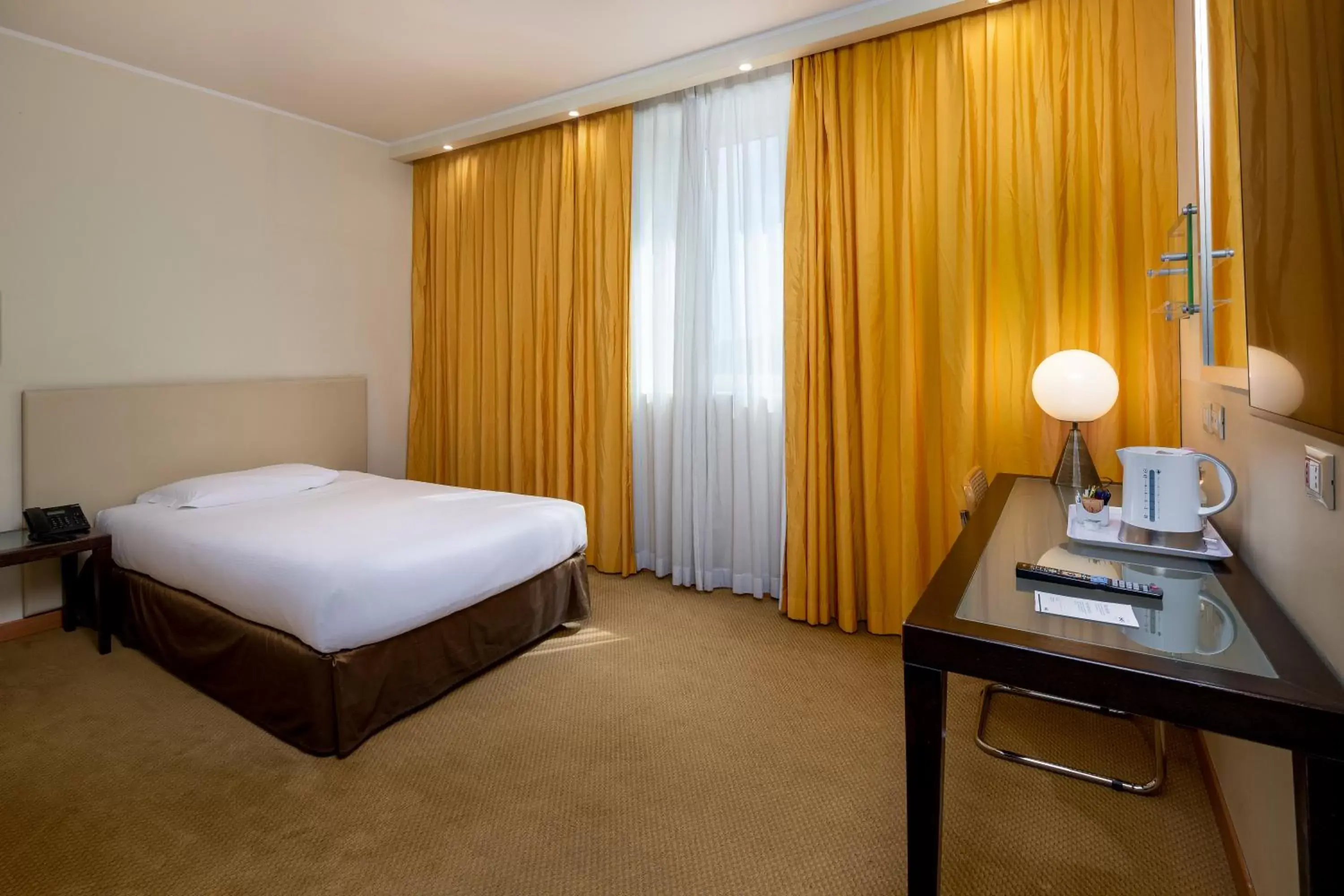 Bedroom, Bed in Crowne Plaza Padova, an IHG Hotel
