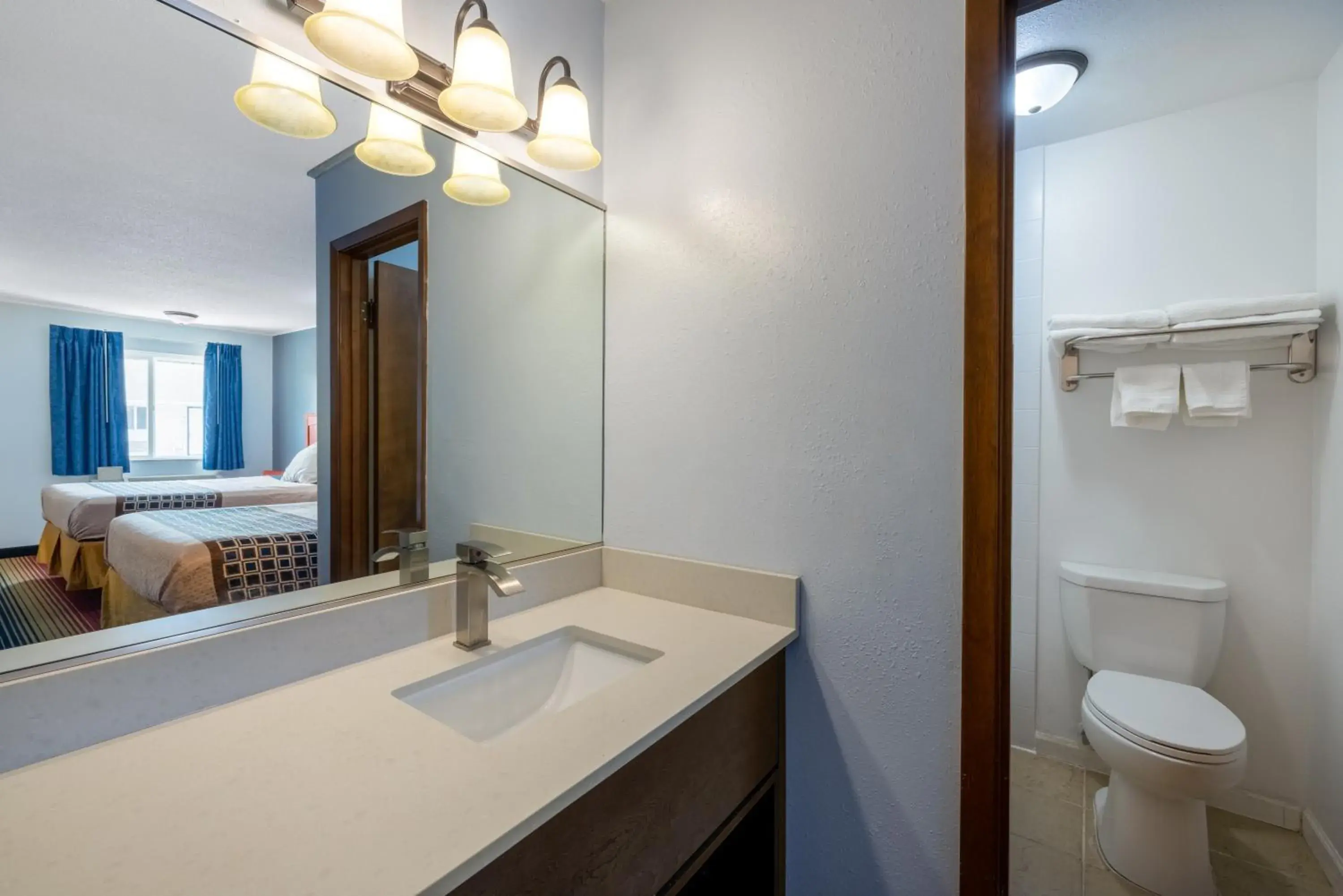 Bathroom in Travelodge by Wyndham Spirit Lake/Okoboji