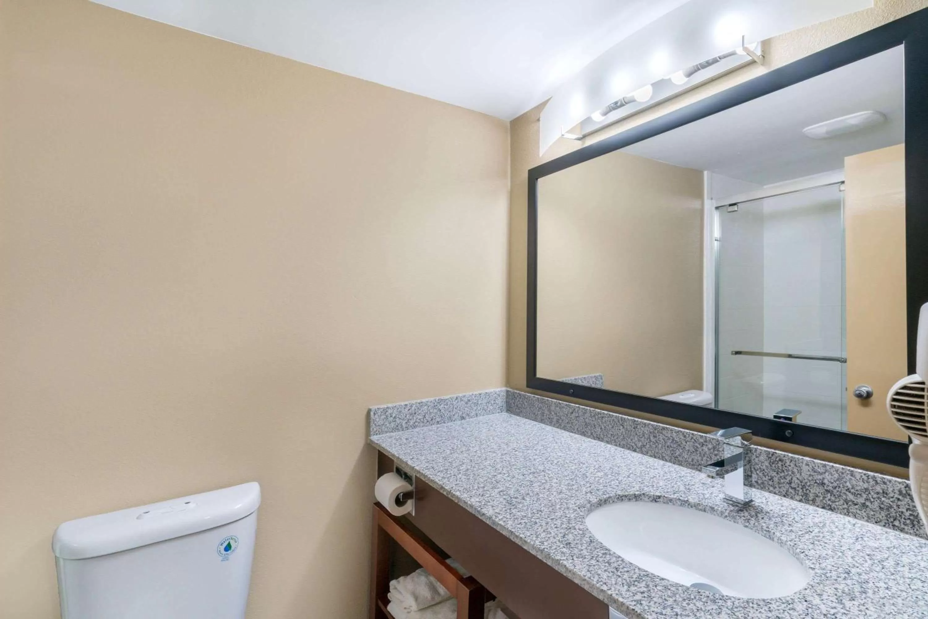 Bathroom in Super 8 by Wyndham Raleigh North East