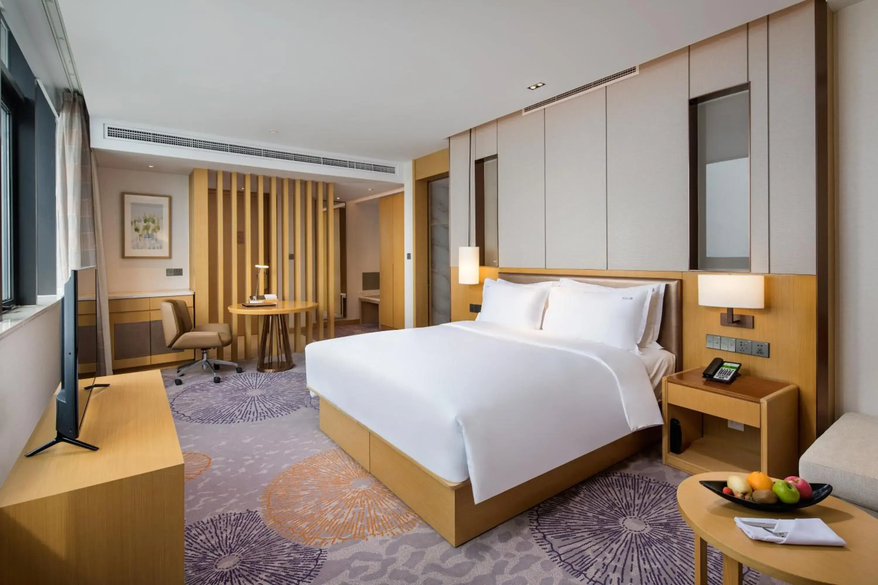 Photo of the whole room, Bed in Holiday Inn Tianjin Xiqing, an IHG Hotel