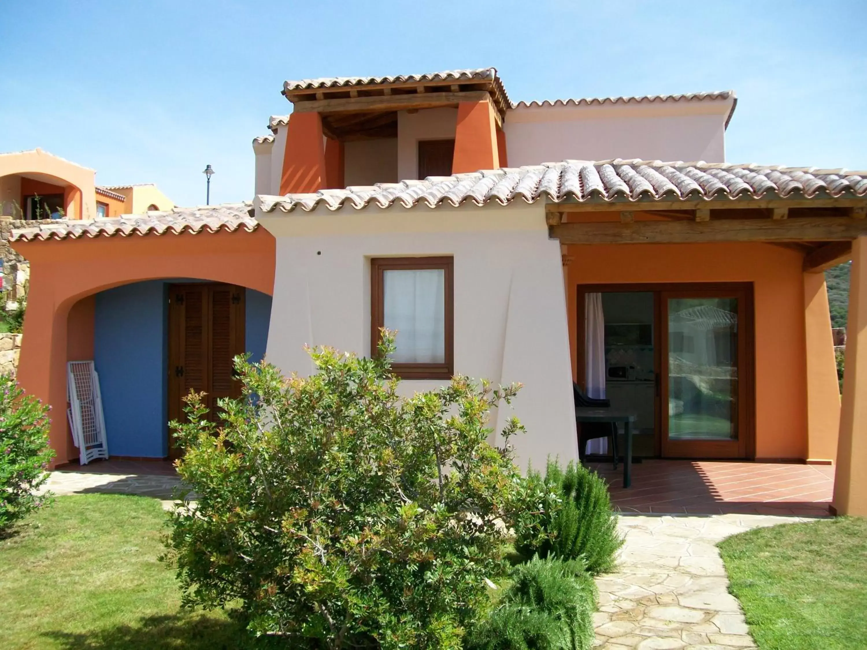 Facade/entrance, Property Building in Porto Ottiolu Resort