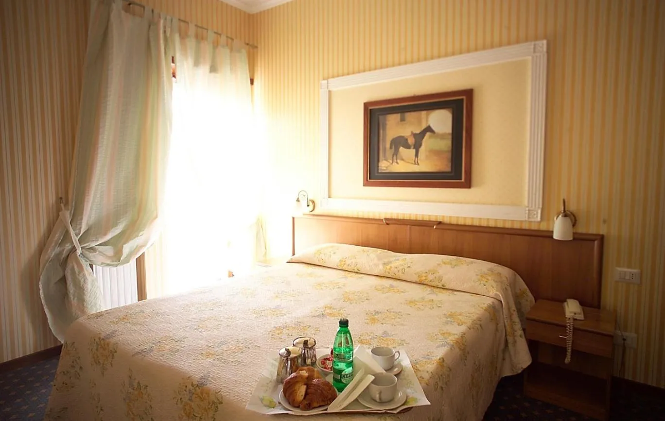 Bed in Hotel Residence Magnolia