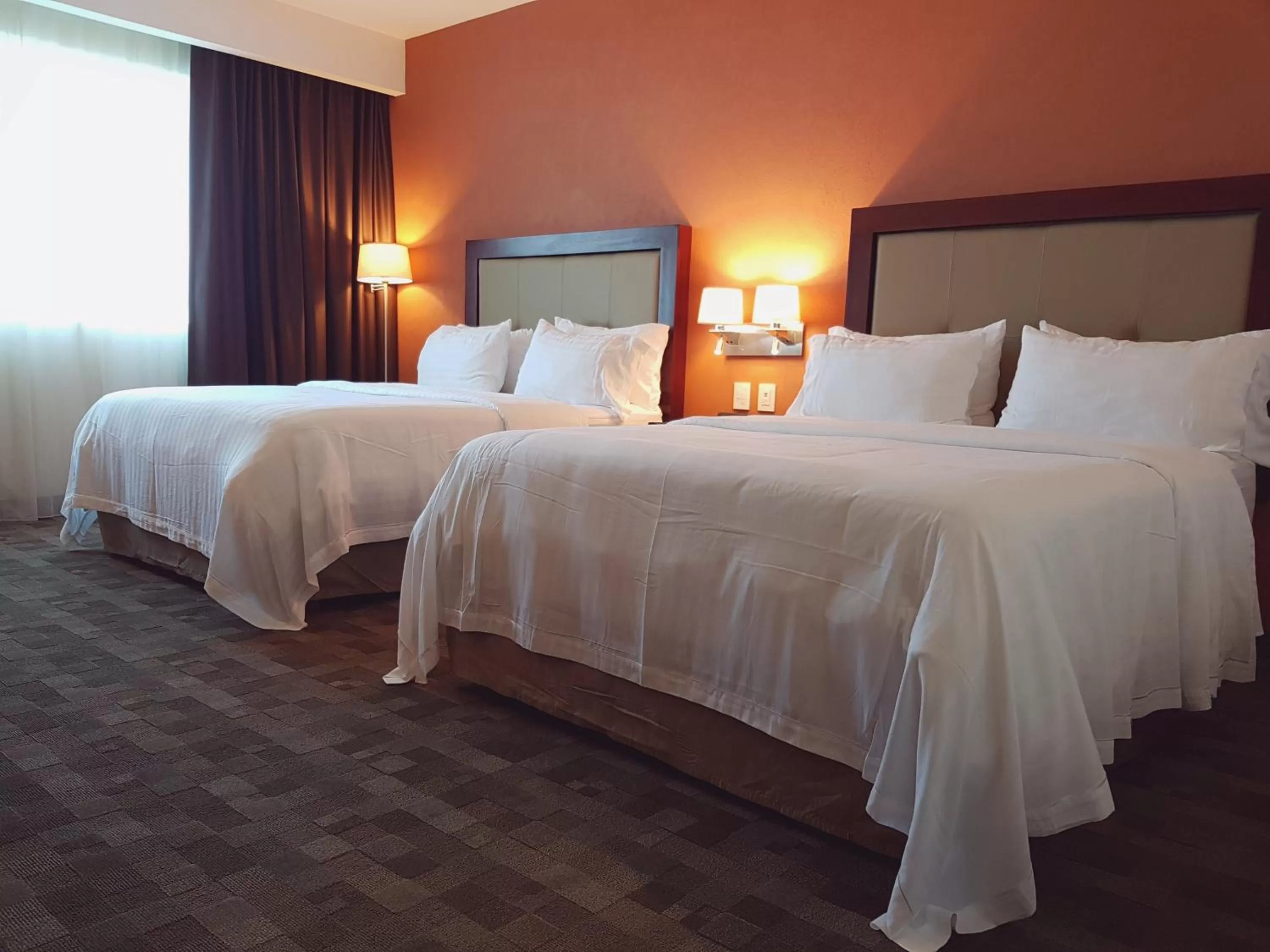 Photo of the whole room, Bed in Holiday Inn & Suites Plaza Mayor by IHG