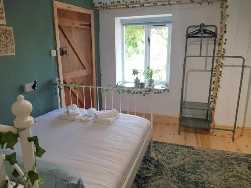 Bedroom, Bed in Middle Cottage Sandy Haven Beach