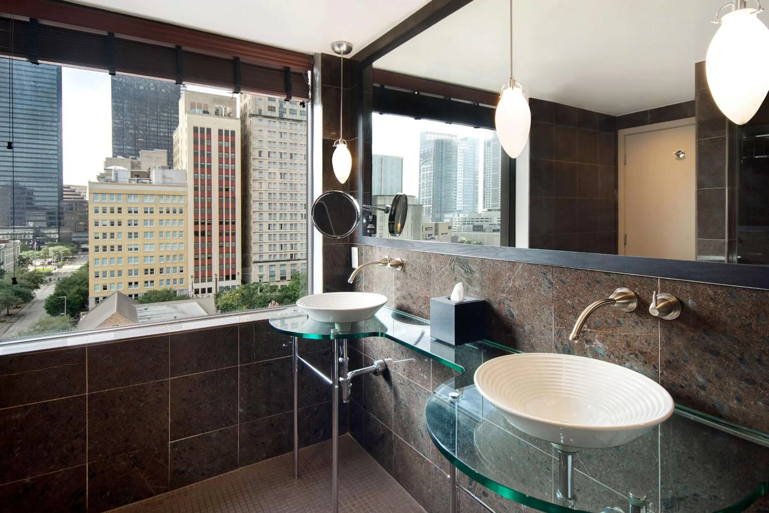 Bathroom in The Sam Houston, Tapestry Collection by Hilton