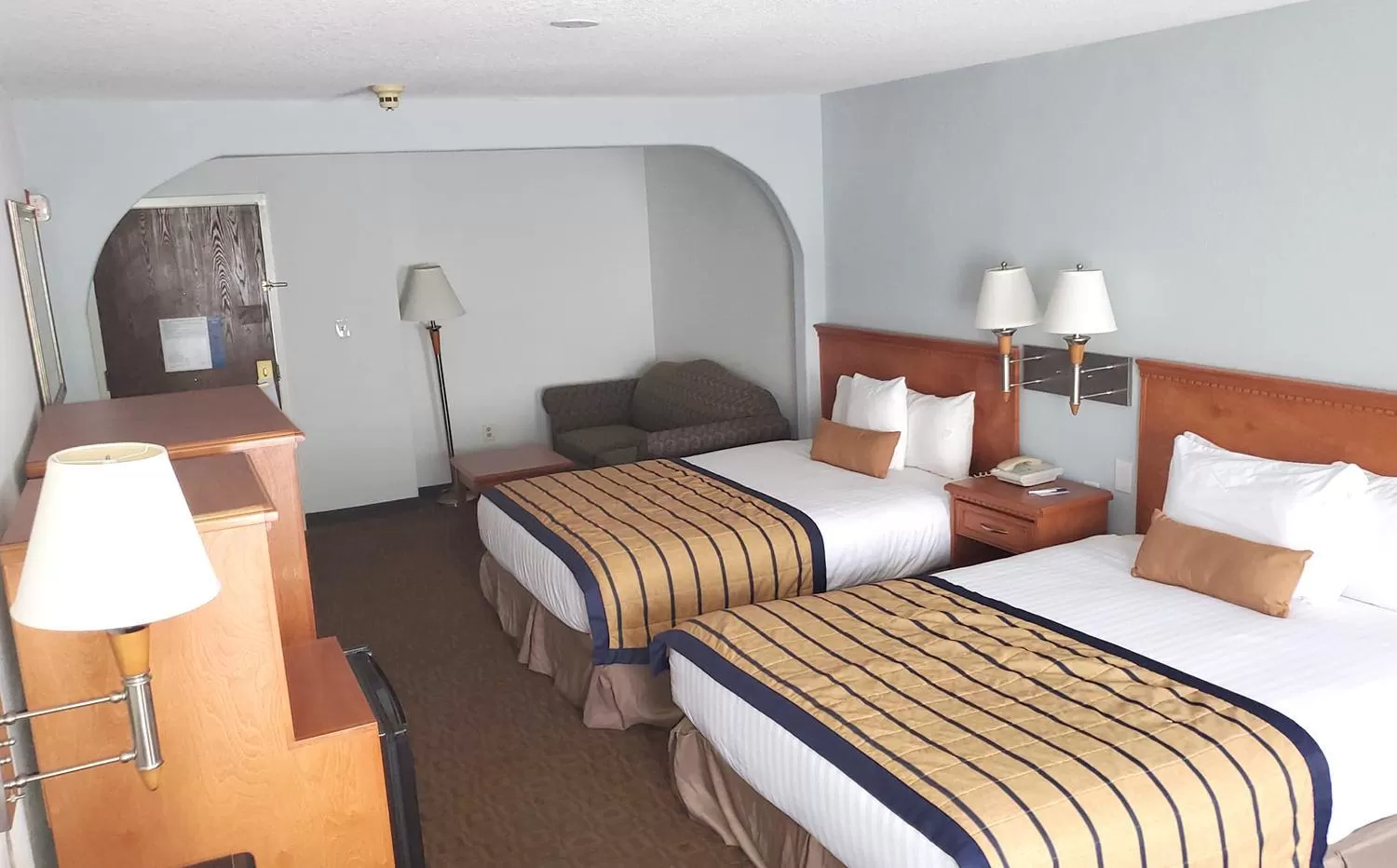Bed in Coratel Inn & Suites by Jasper New Braunfels IH-35 EXT 189