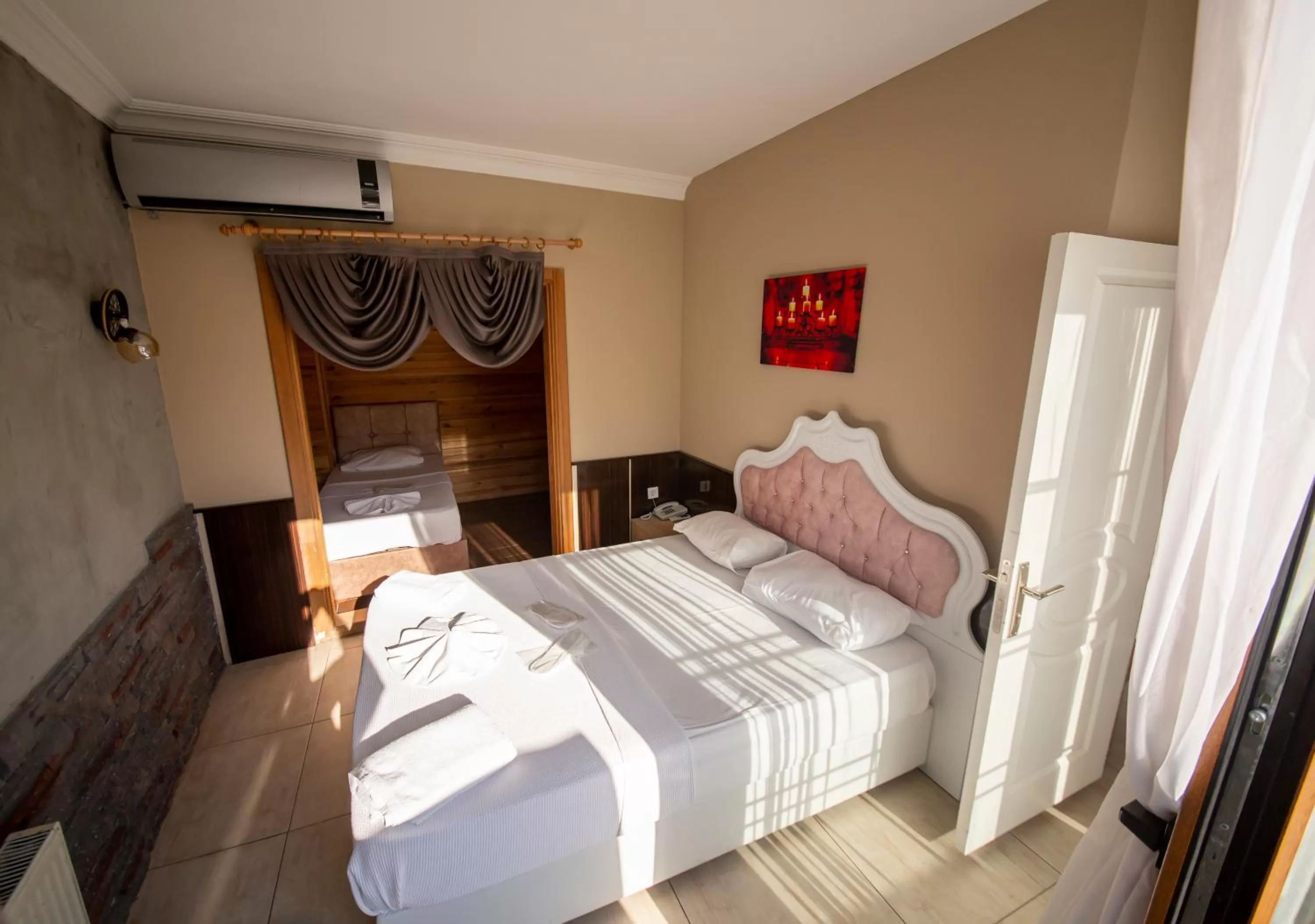 Bed in Royal Palace Hotel