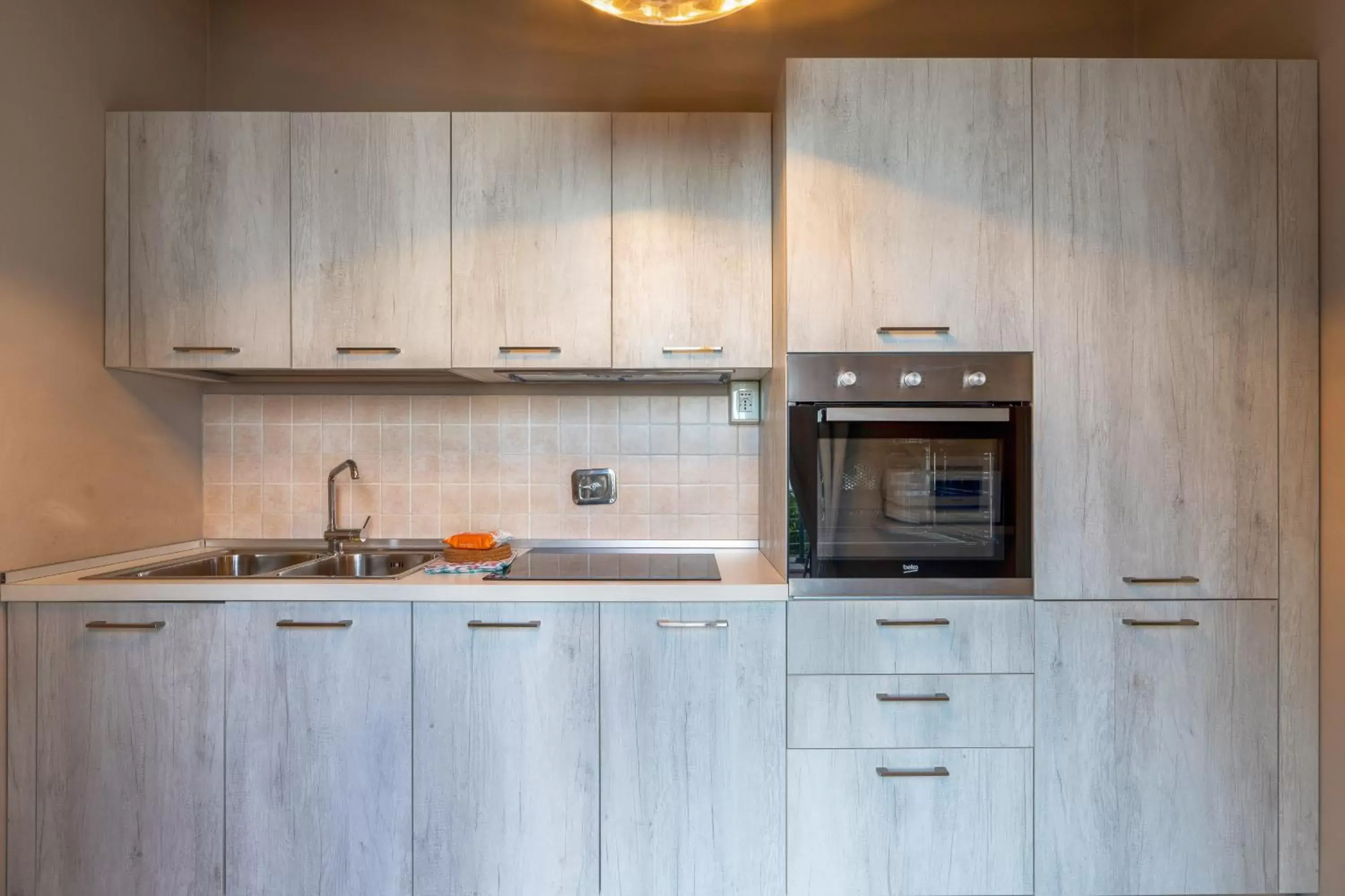 Kitchen/Kitchenette in Baba Residences