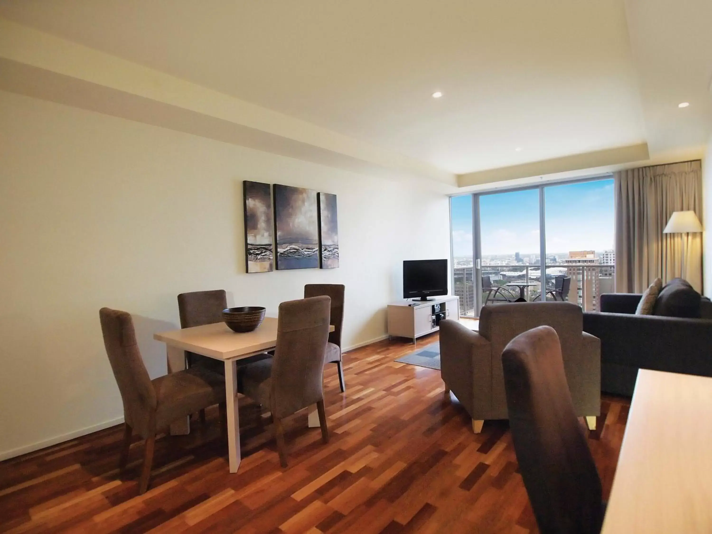 Living room, Dining Area in Oaks Melbourne on Lonsdale Suites