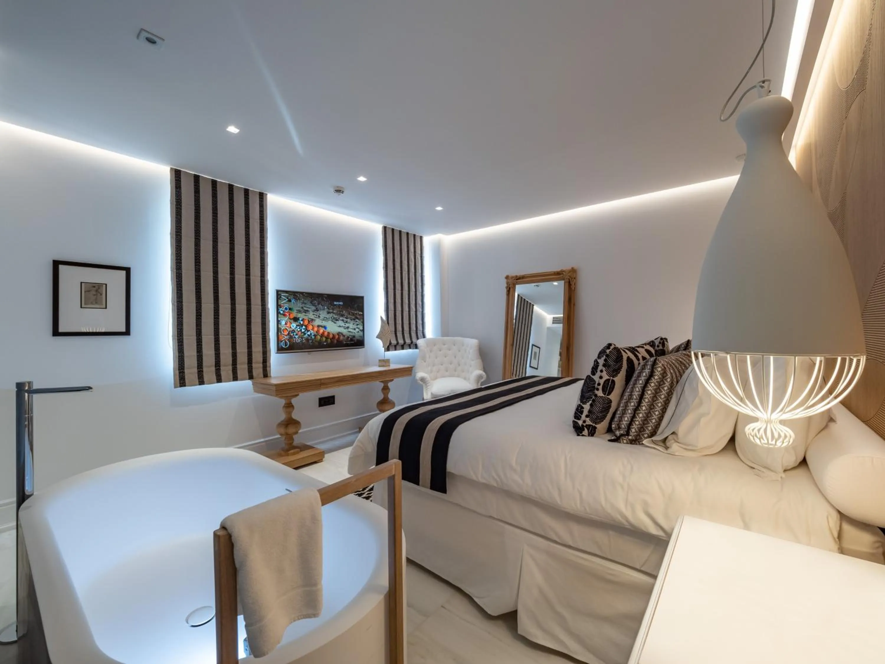 Bed in Abaton Island Resort & Spa