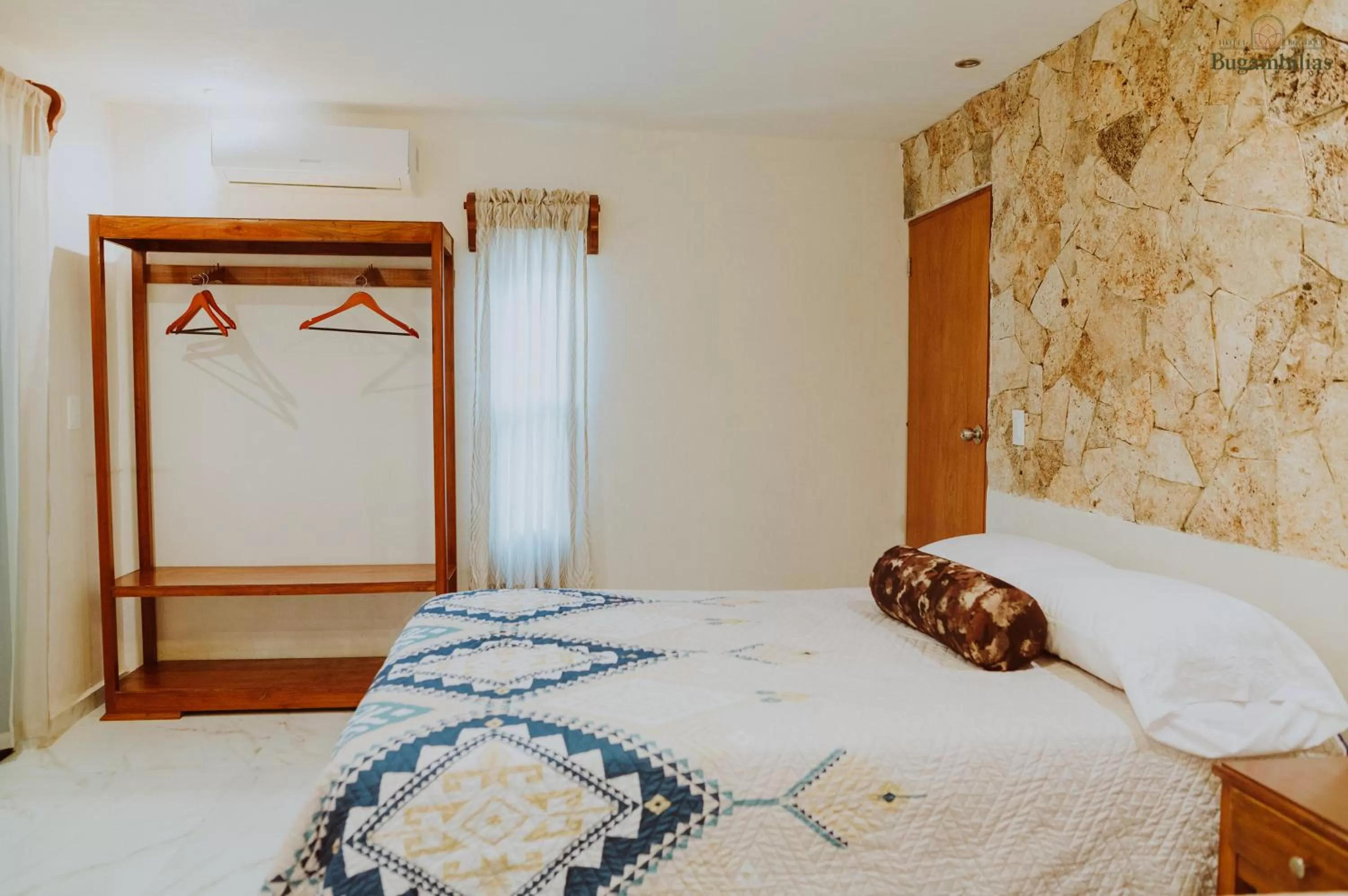 Bed in Hotel Boutique Bugambilias