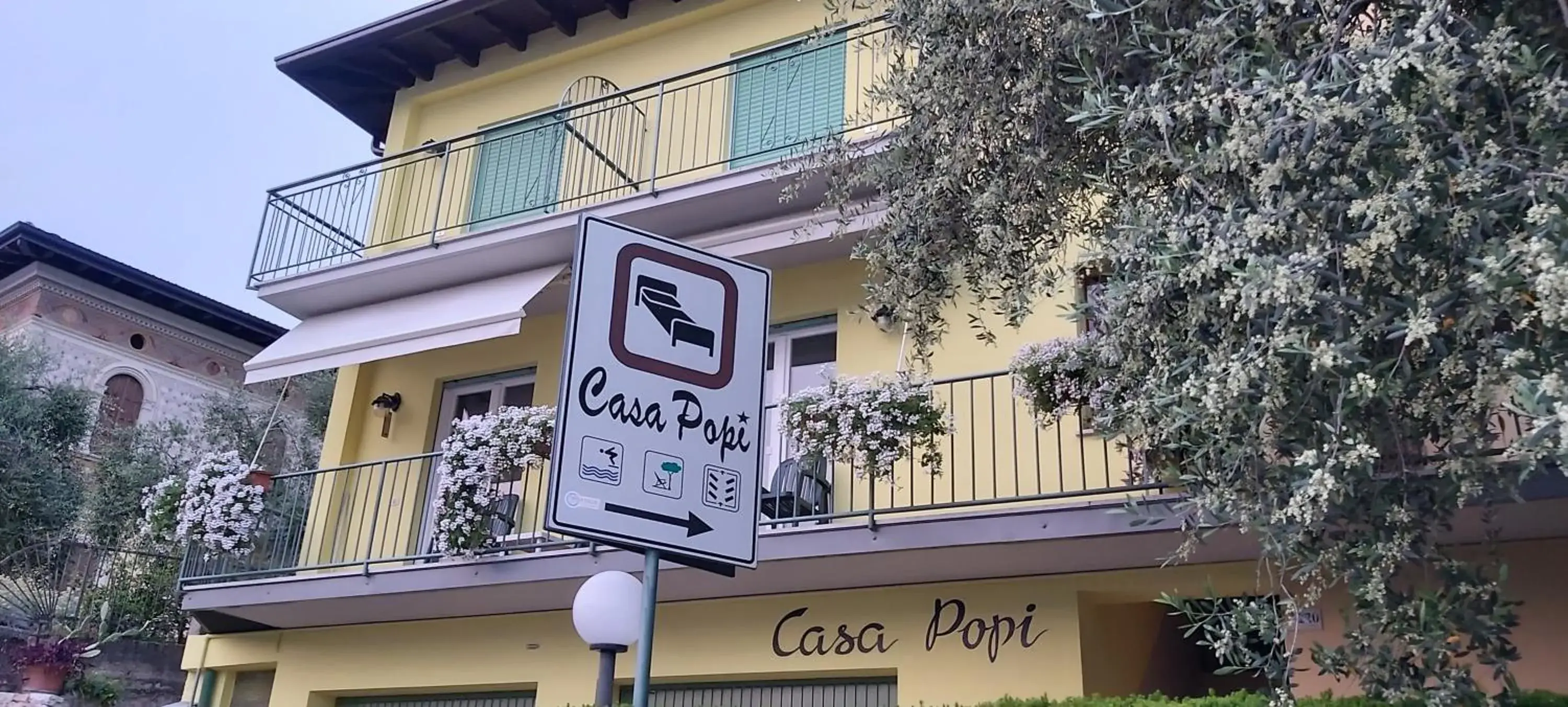 Property Logo/Sign in Hotel Casa Popi
