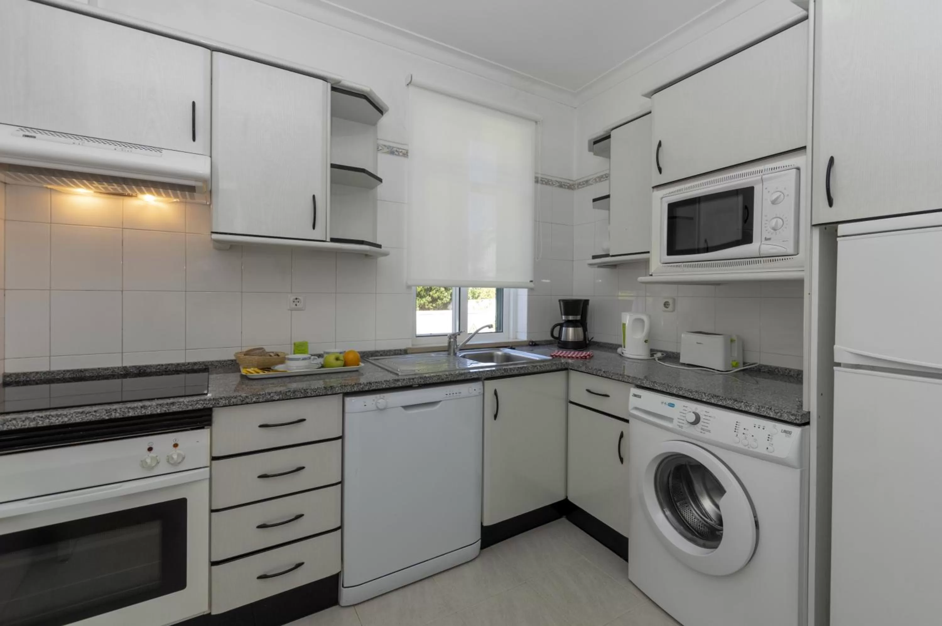 Kitchen or kitchenette in Rocha Brava Village Resort