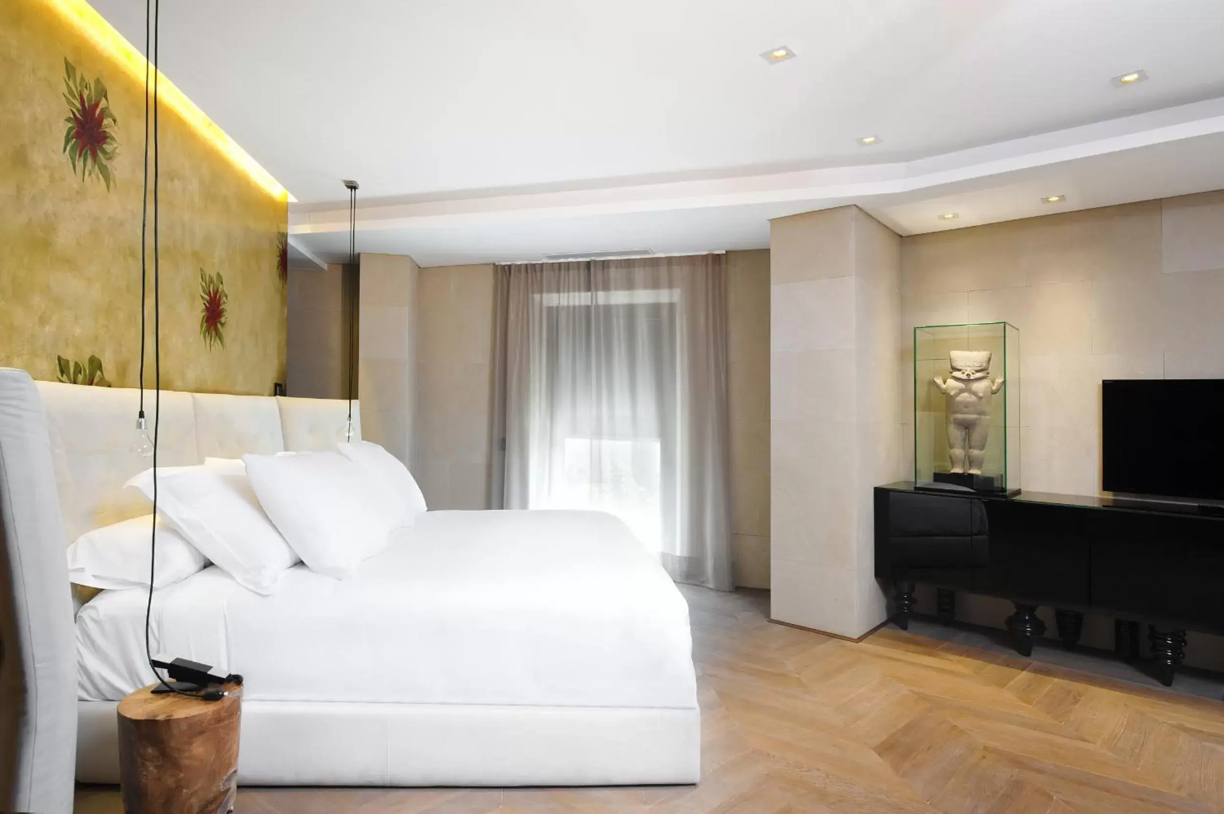 Bedroom, Bed in Claris Hotel & Spa GL, a Small Luxury Hotel of the World