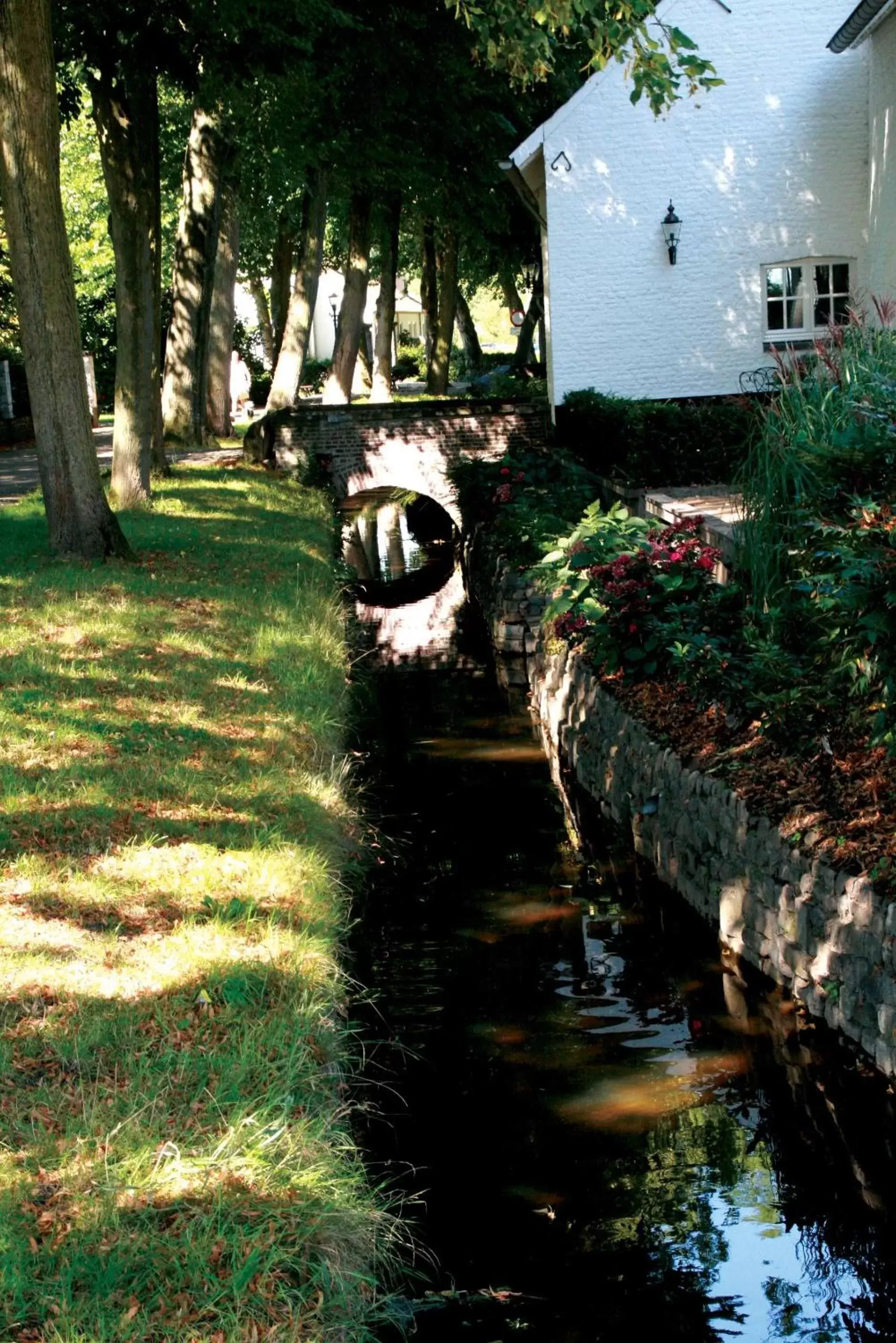 Area and facilities, Garden in Fletcher Hotel La Ville Blanche