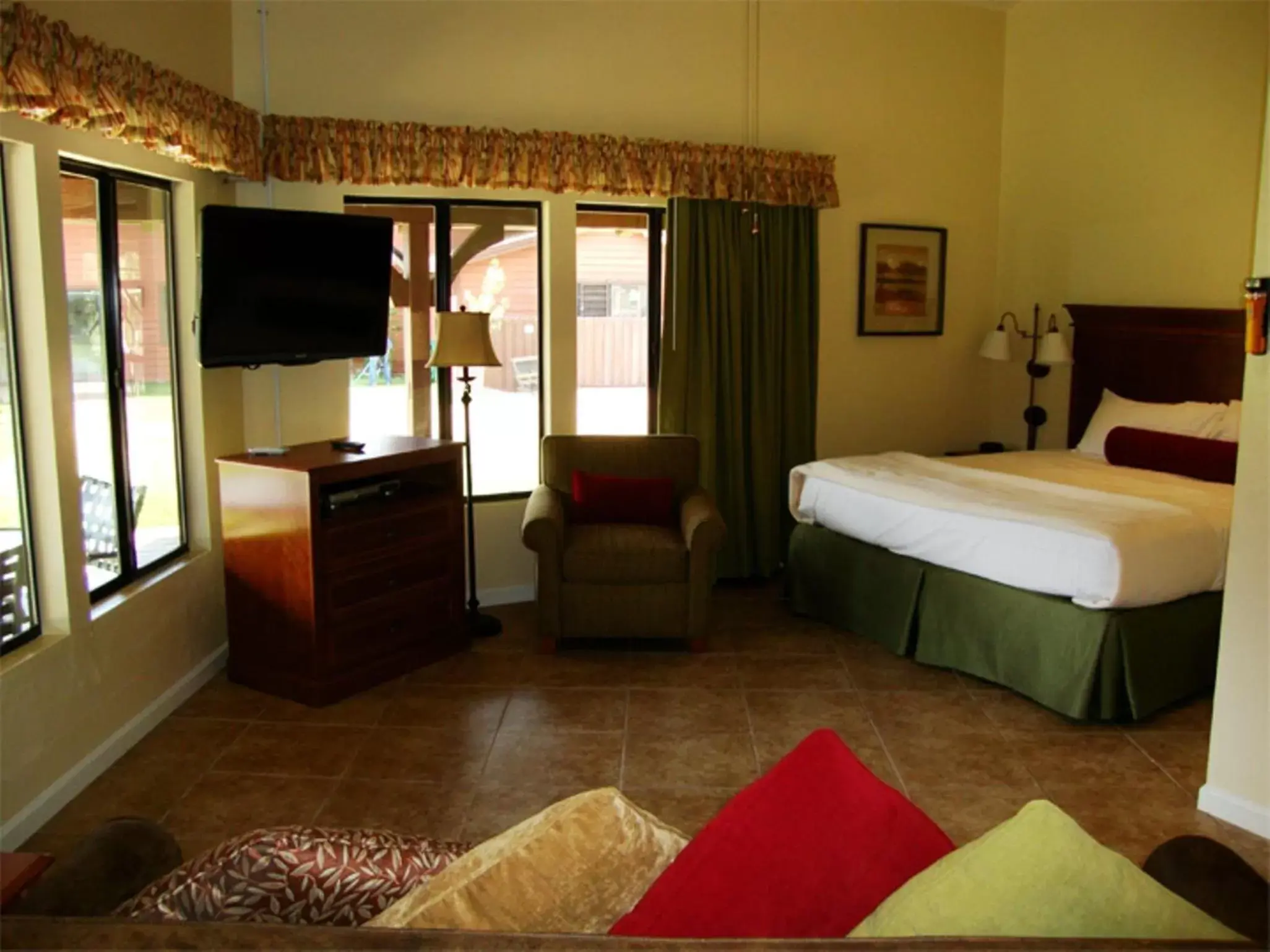 Bed in Roundhouse Resort, a VRI resort