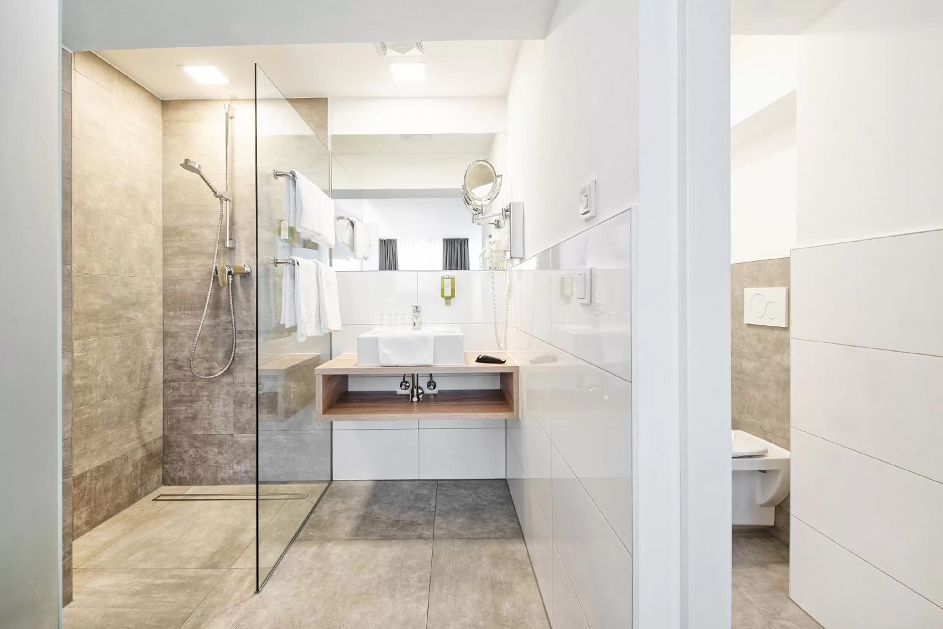 Bathroom in Hotel Velden - 24 Checkin Zimmer im Zentrum