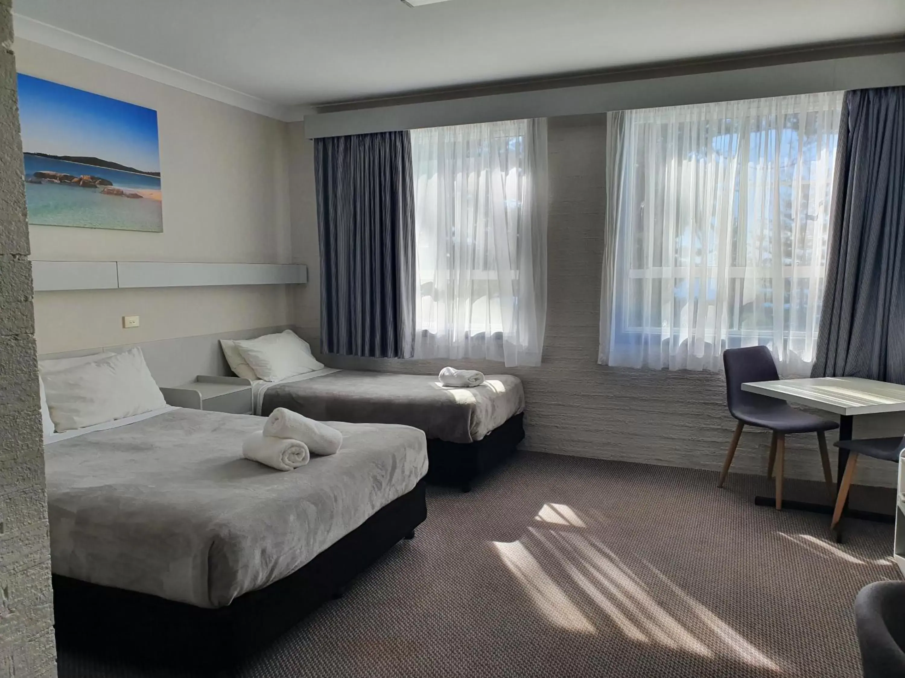 Bed in Seabreeze Beach Hotel
