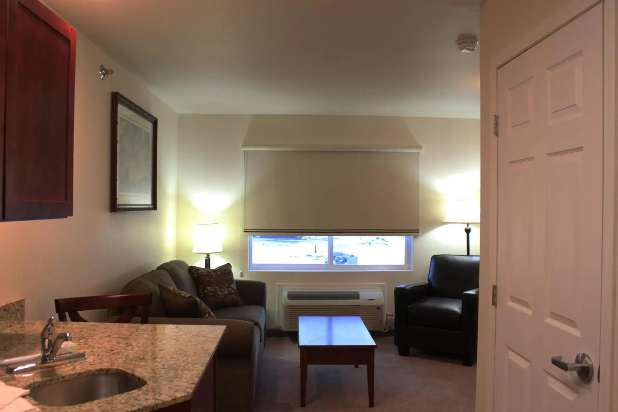 Living room, TV/Entertainment Center in Extended Stay Americas Suites - Minot