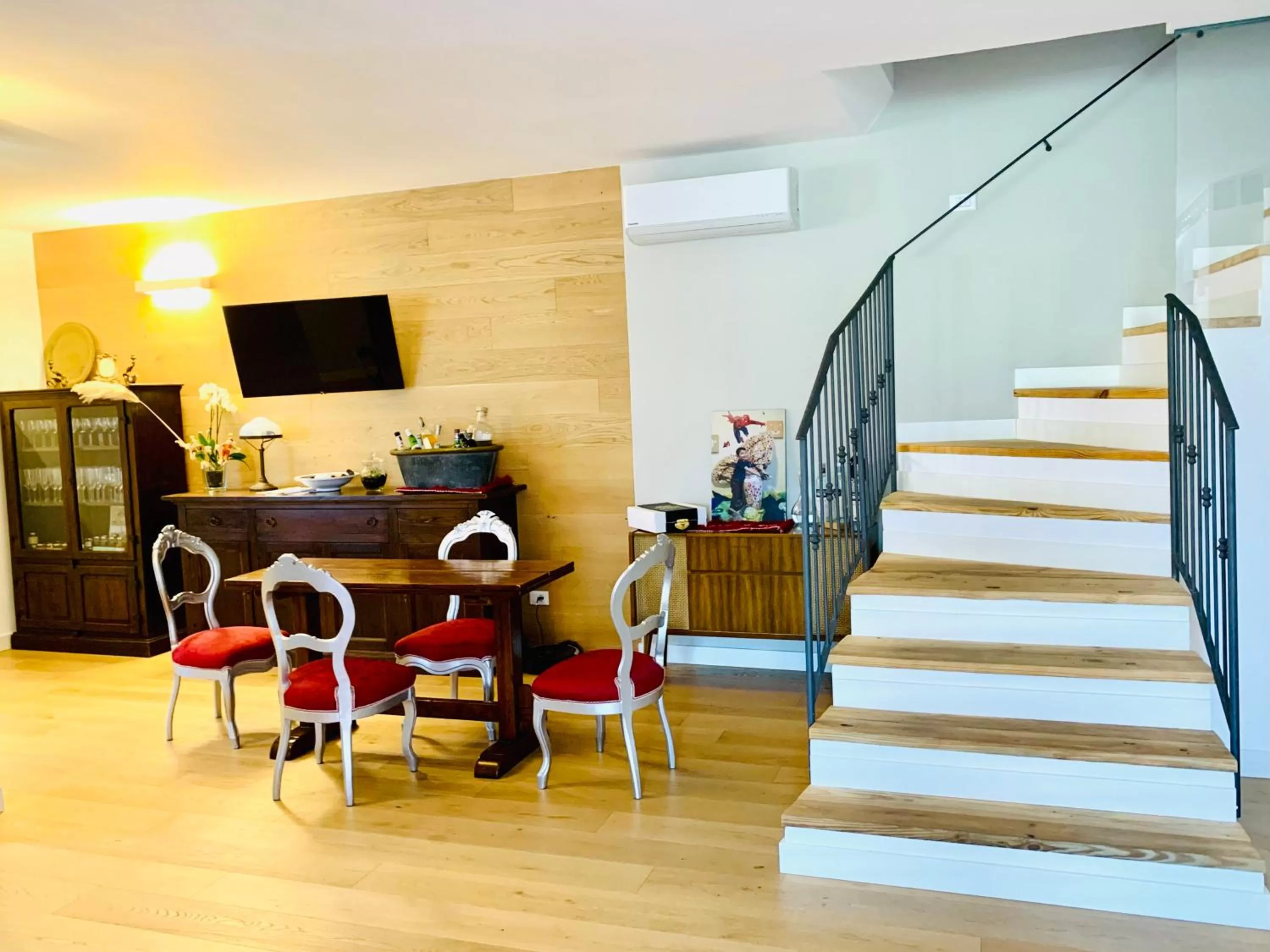 Communal lounge/ TV room in Le Stanze del Brigante