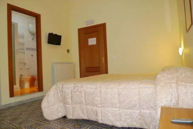 Photo of the whole room, Bed in Come D'Incanto A Napoli
