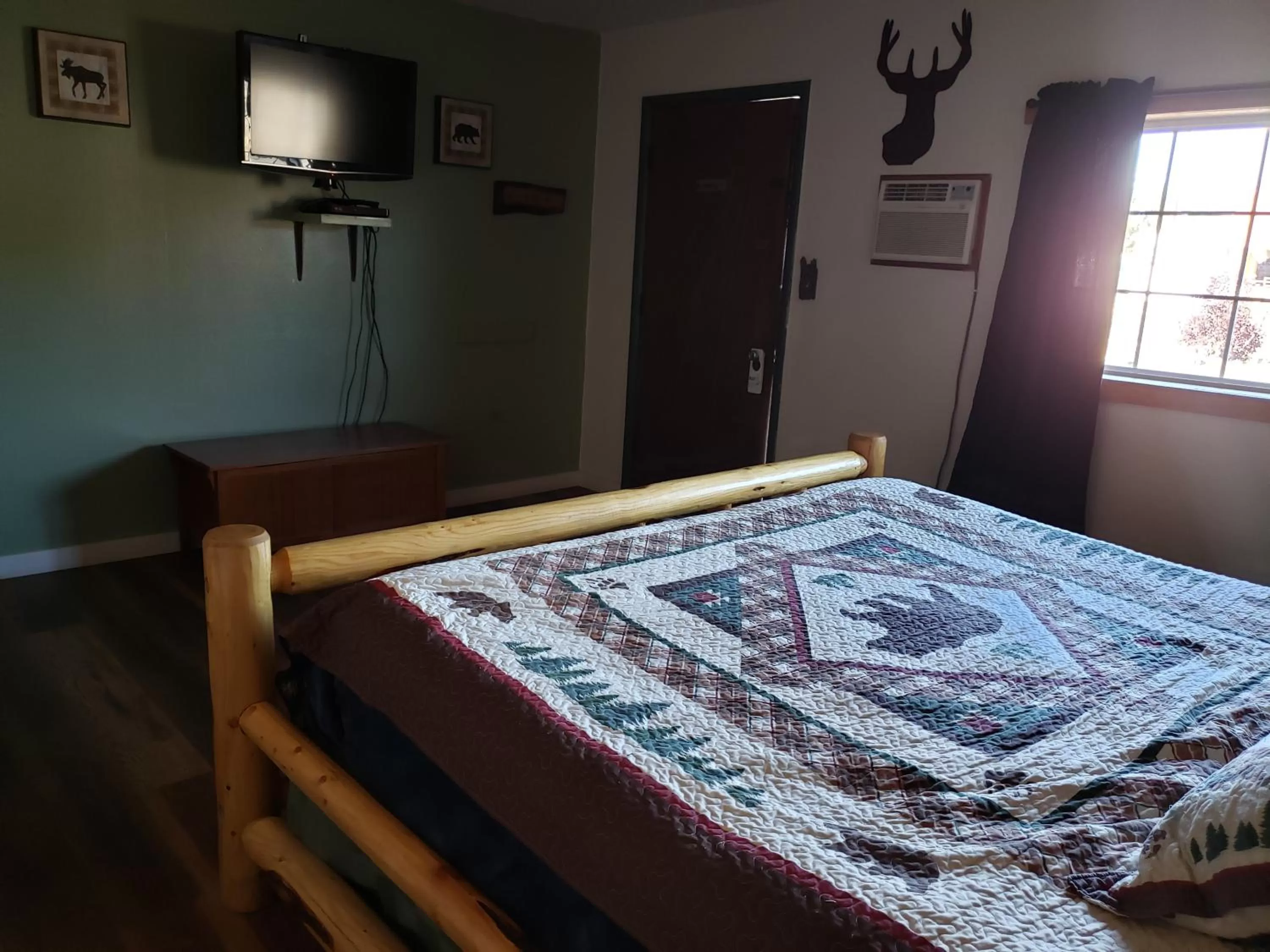 Bed in CRESCENT MOON MOTEL