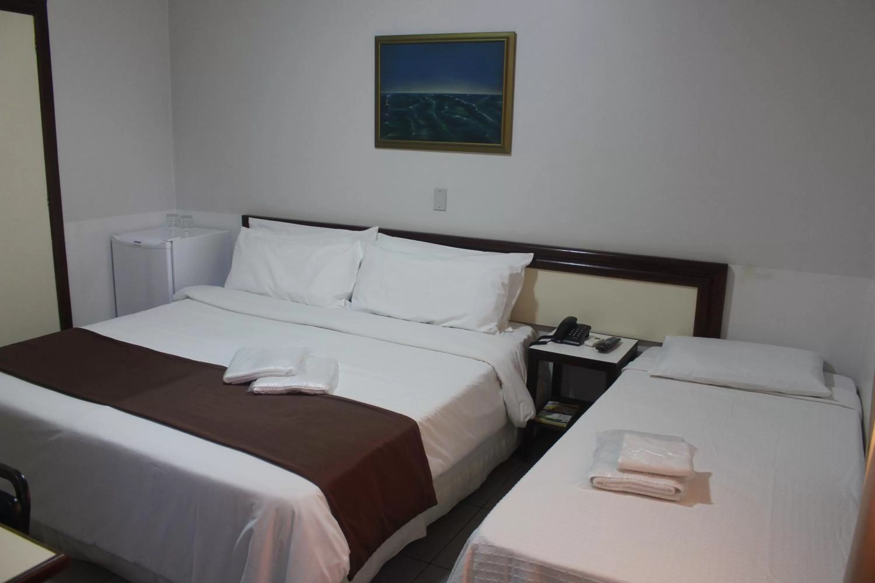 Bed in Hotel Oscar Econômico Montes Claros