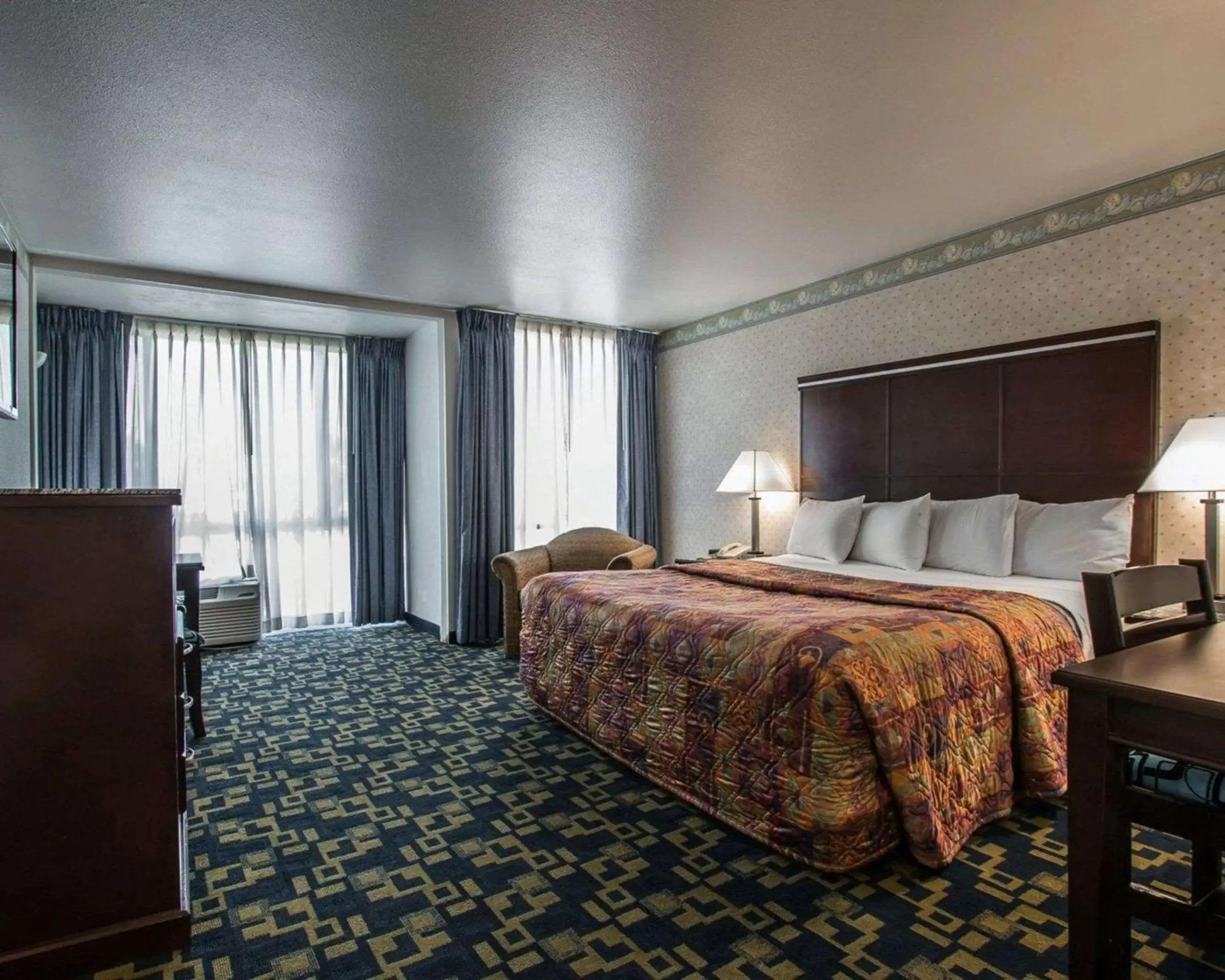 Photo of the whole room, Bed in Rodeway Inn Oceanside Marina