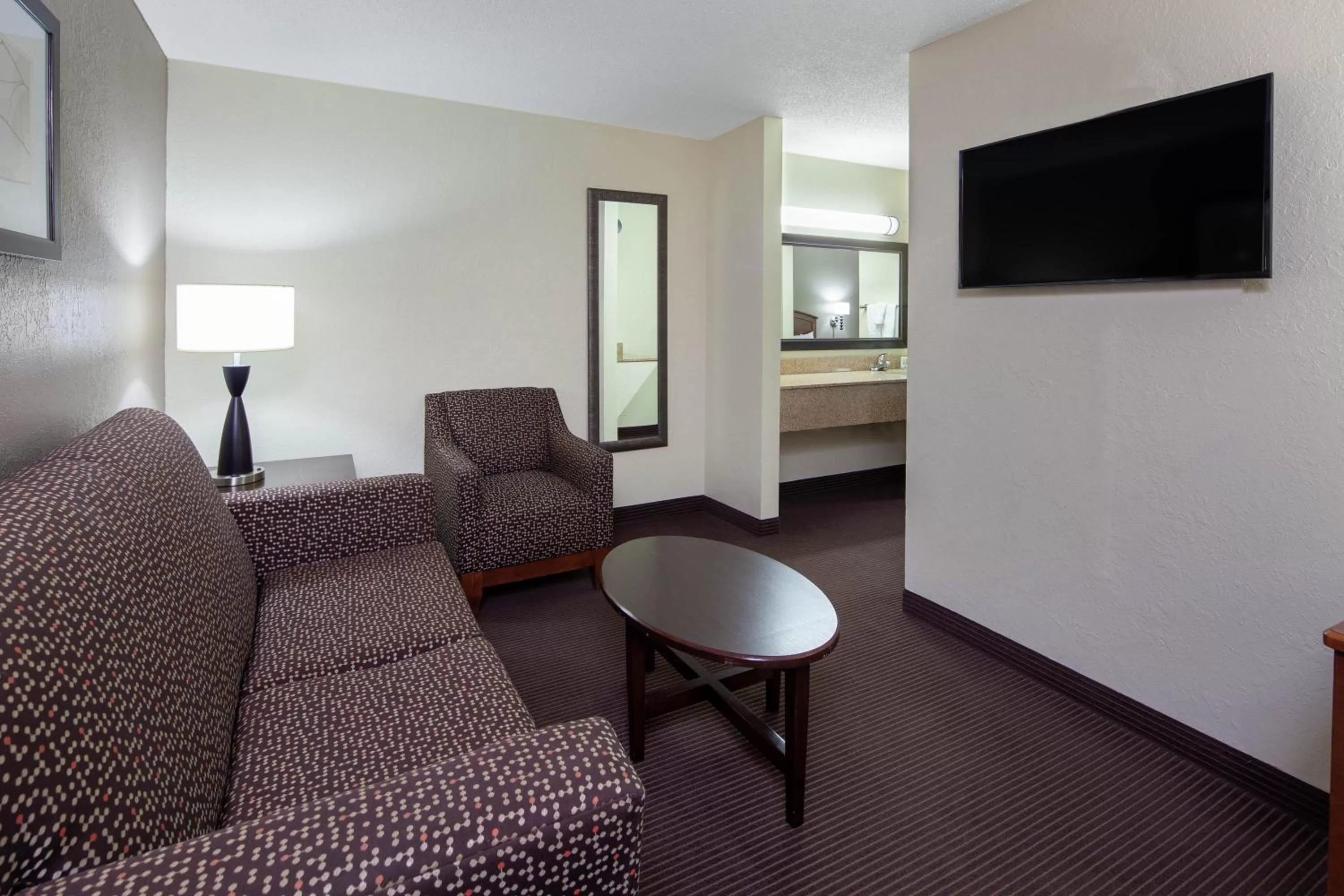 Living room in AmericInn by Wyndham Ironwood