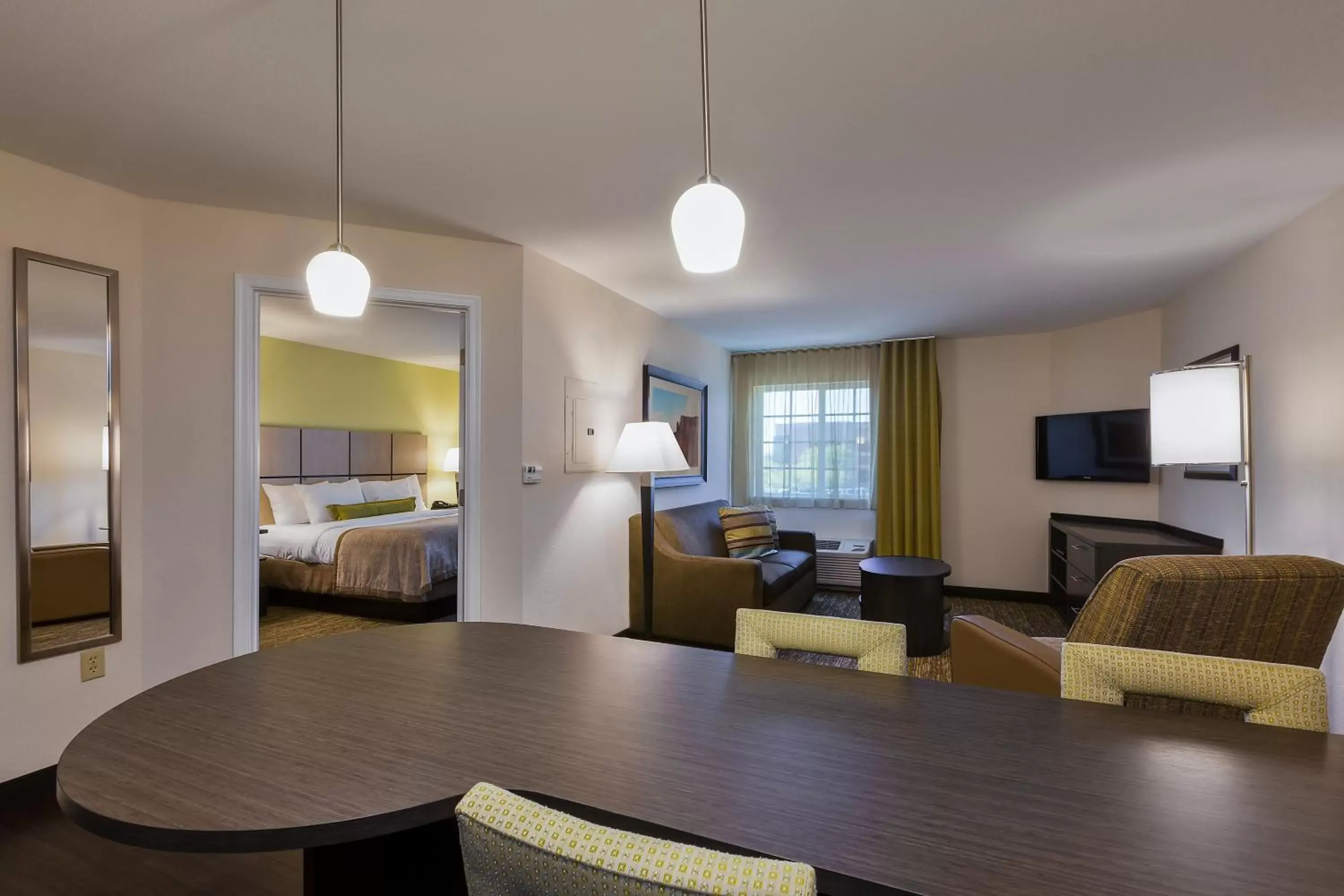 Bedroom, Seating Area in Candlewood Suites Tucson, an IHG Hotel