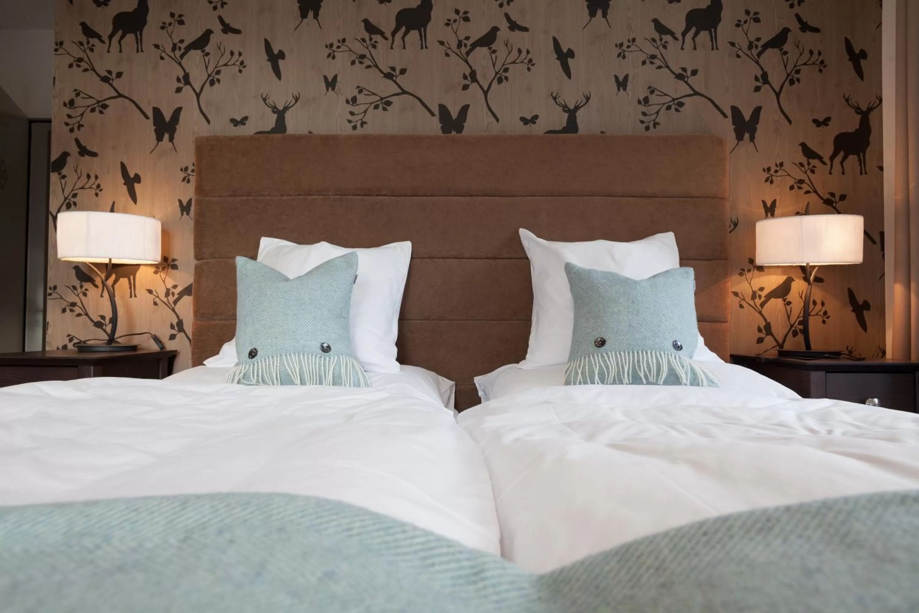 Bed in Boutique-Hotel Garni Bellevue Davos Wiesen