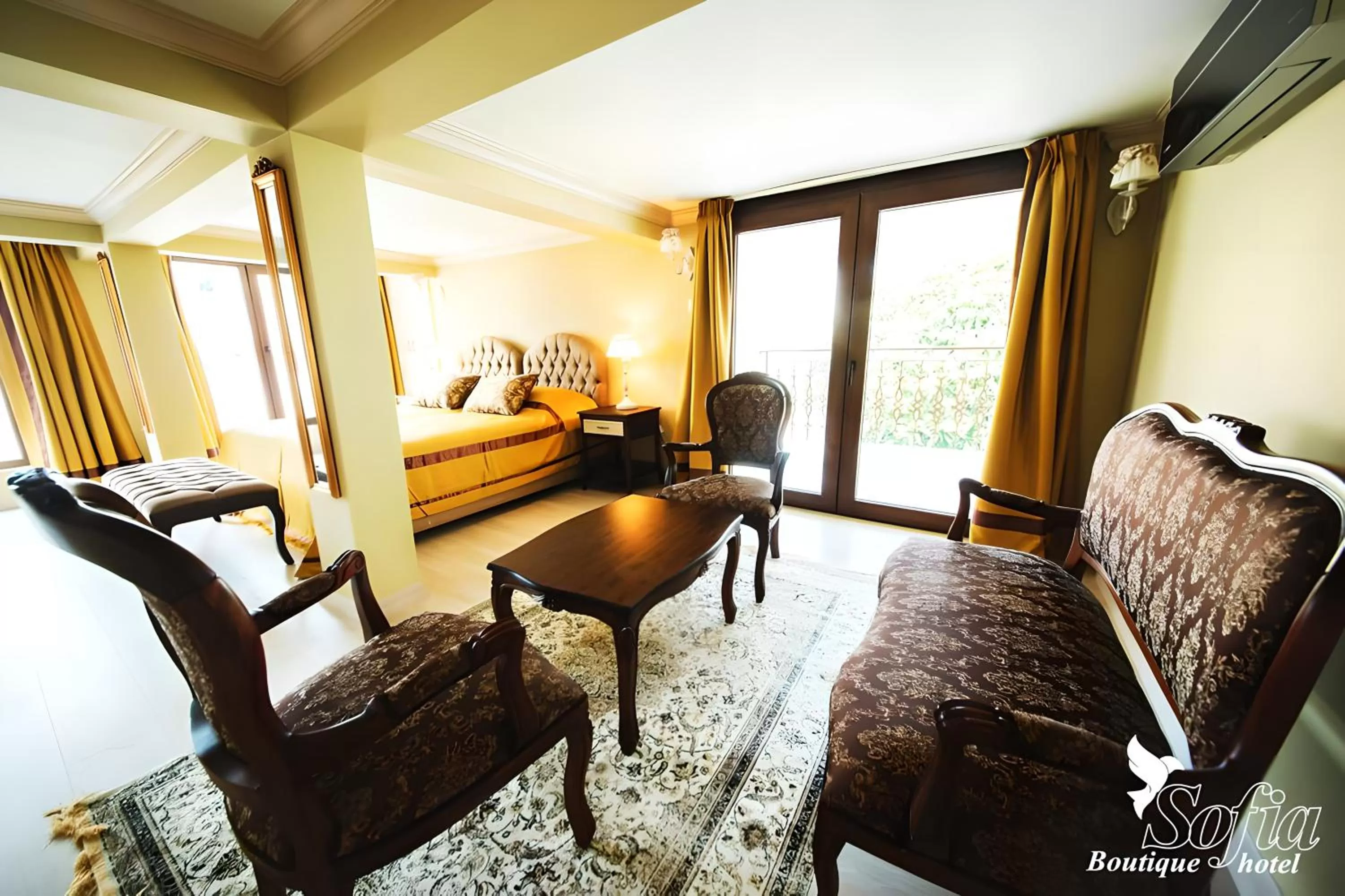 Bed in SOFIA BOUTIQUE HOTEL