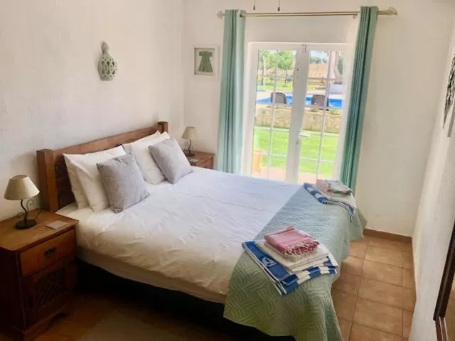 Double Room with Pool View in Casa Jardim Oasis