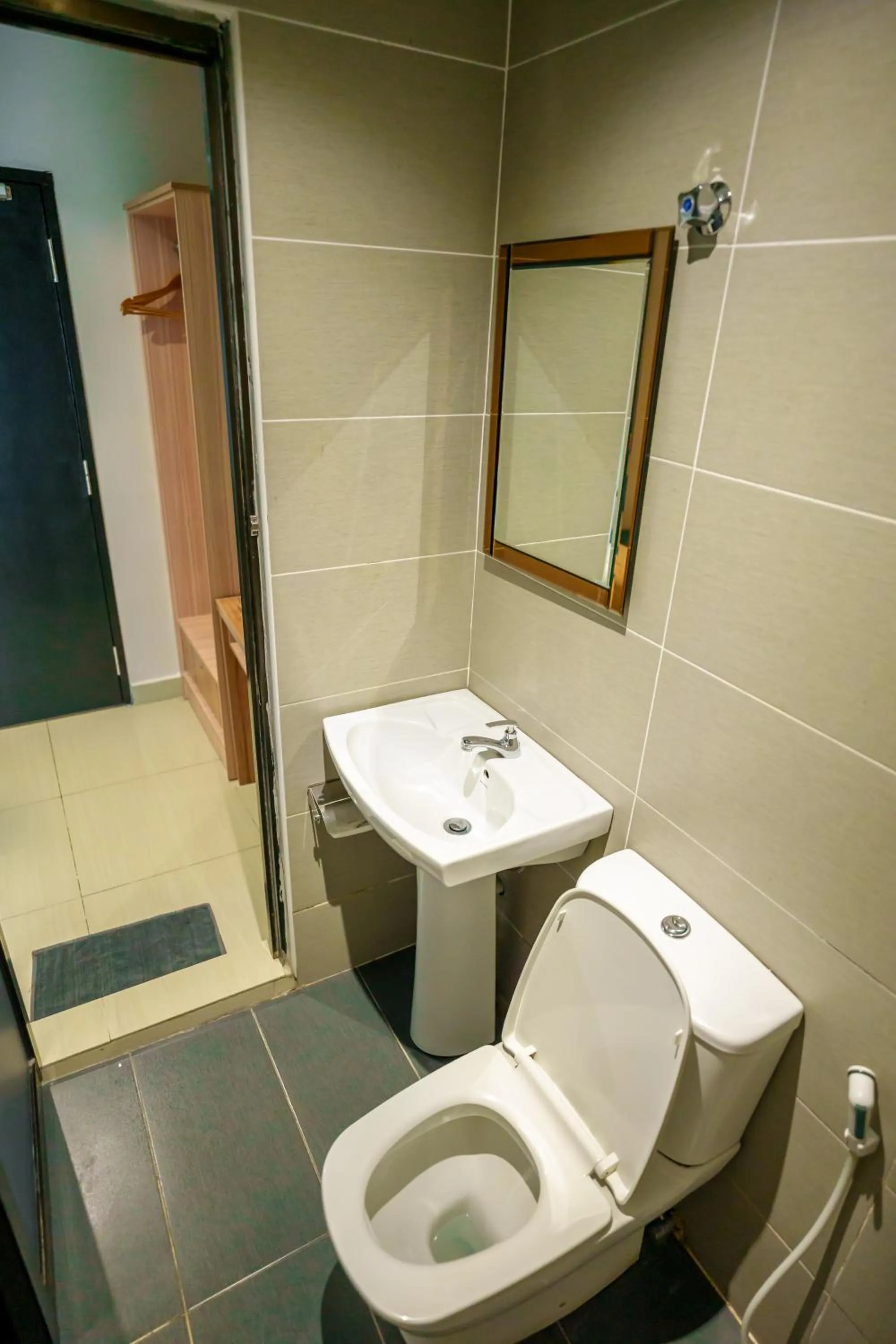 Toilet in Alaxis Hotel