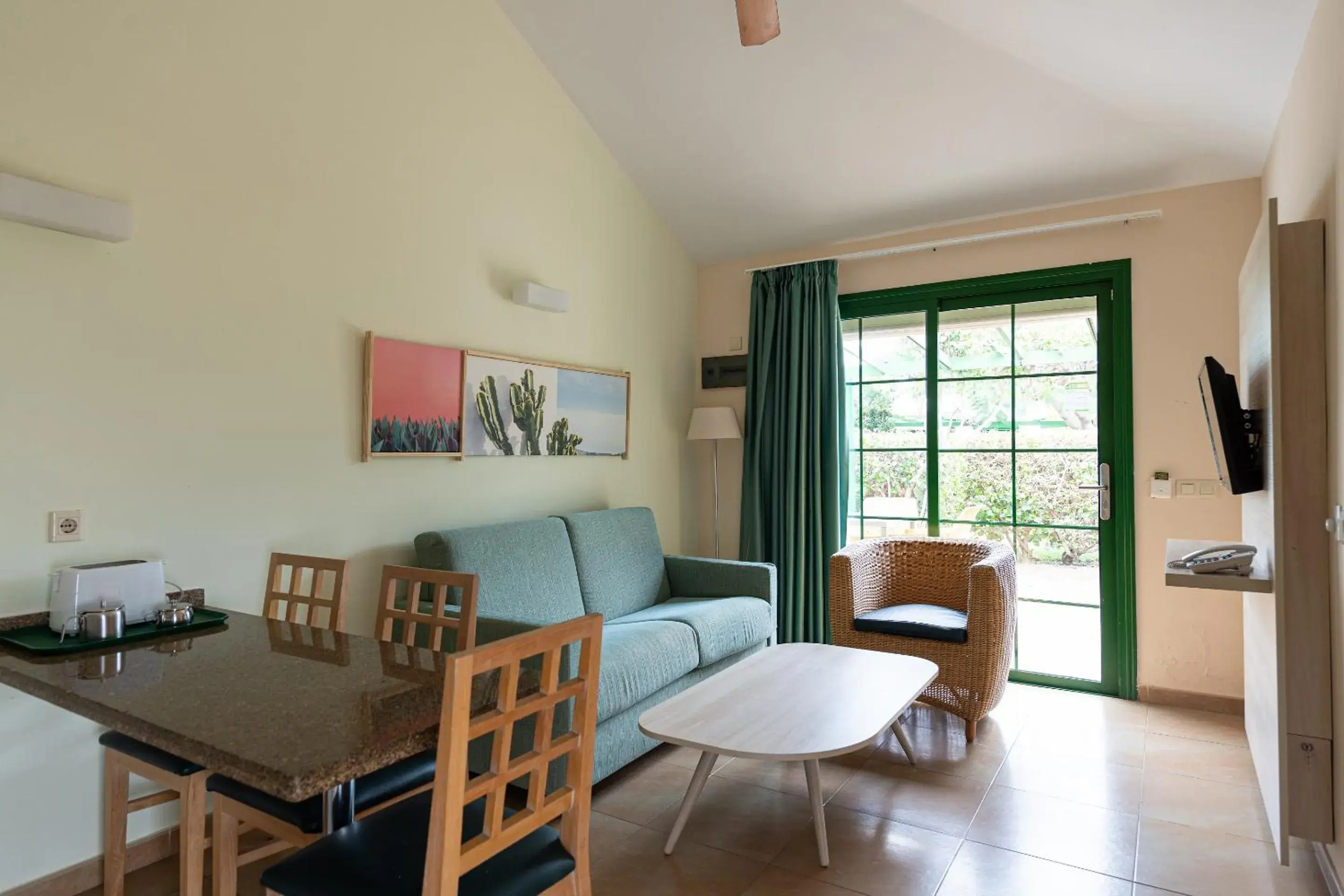 Living room in Bungalows Cordial Sandy Golf Living room in Bungalows Cordial Sandy Golf